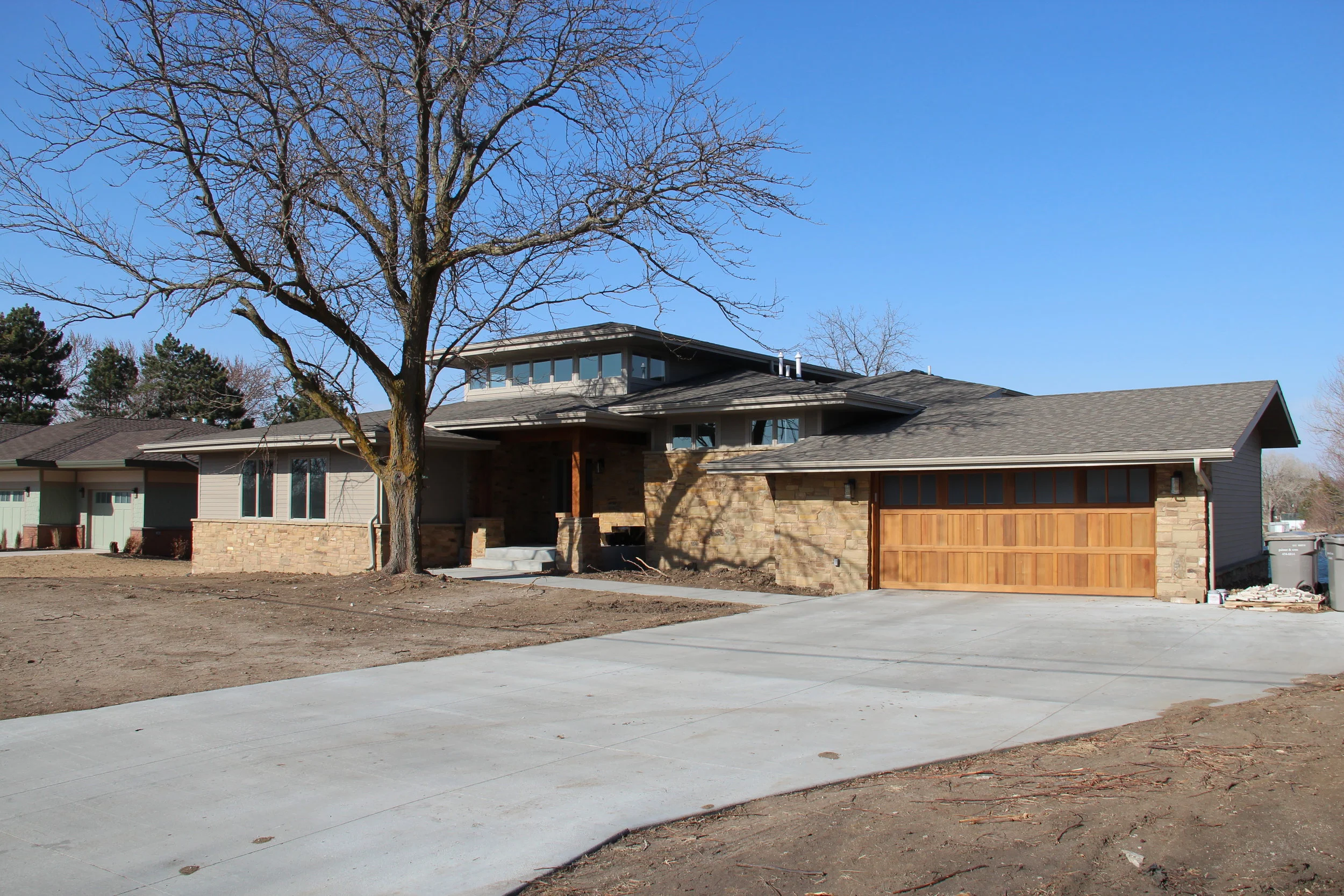  After, modern craftsman style exterior. 