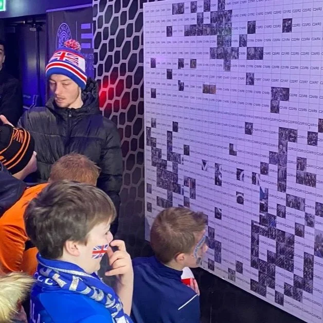 Social Jungle Social Mosaic activation showing a branded collaborative photo mosaic at a fan event