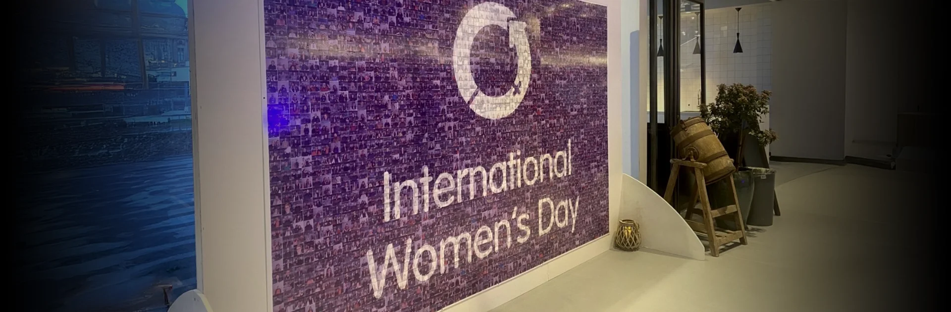 Photo mosaic hire UK — completed social mosaic wall built from guest photos at an International Women's Day corporate event