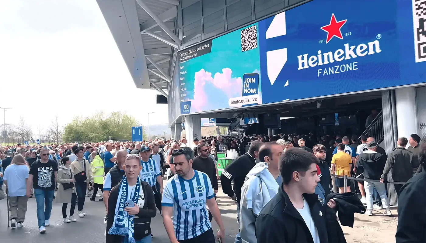 Brighton & Hove Albion fans arriving at the Amex Stadium fan zone by Social Jungle