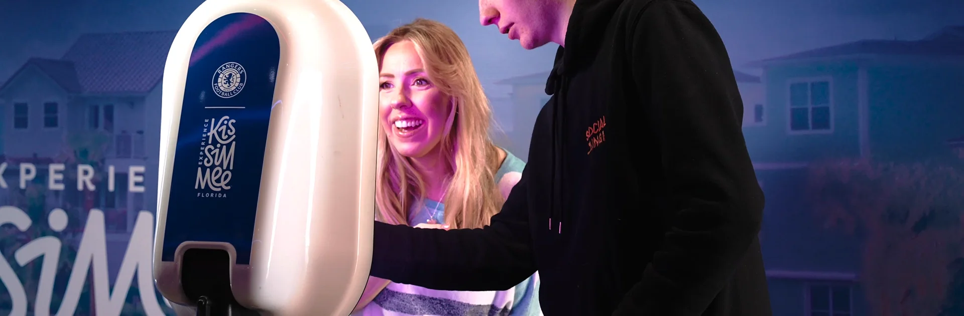 AI photo booth hire at a fan zone event with guests engaging with the activation by Social Jungle