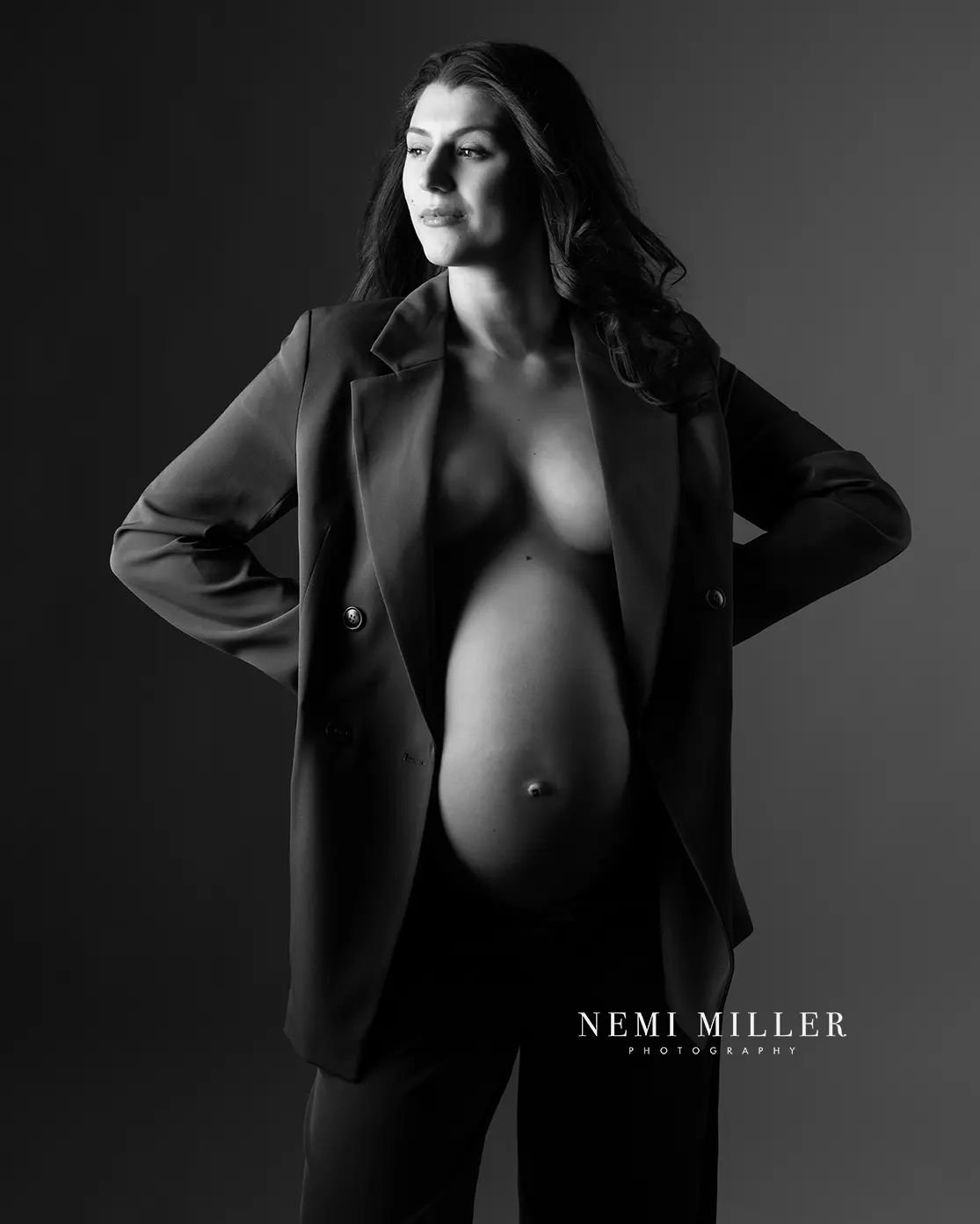Suits look fab in maternity photoshoots so please bring one if you got one. White looks just as lovely as a dark one. Then a we have to do is strike the pose and add some creative lighting. 

______________________________________

  www.nemimiller.c