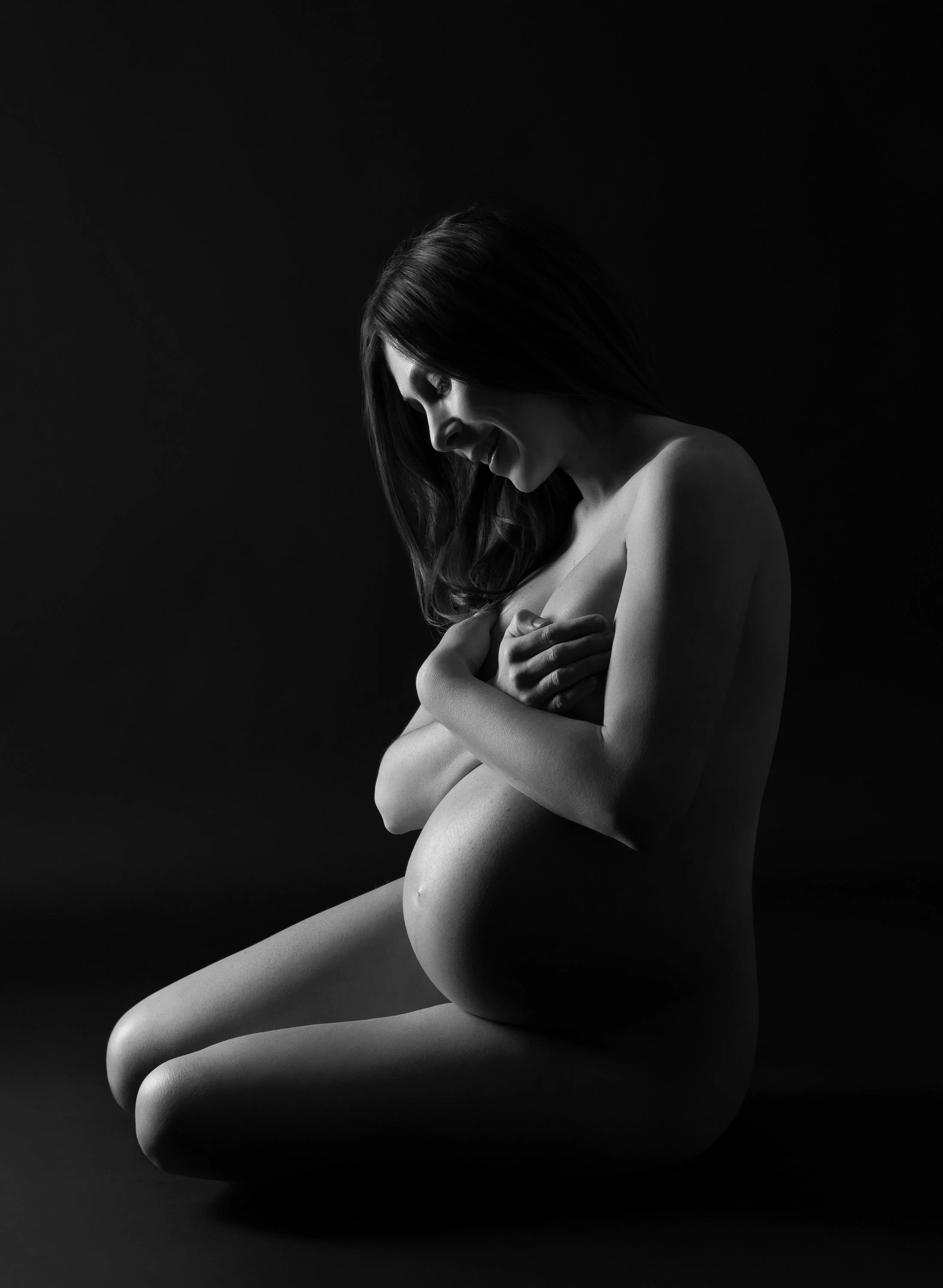 	
Artistic nude pregnancy photoshoot by Nemi Miller - a specialist maternity photographer with a West London photography studio.