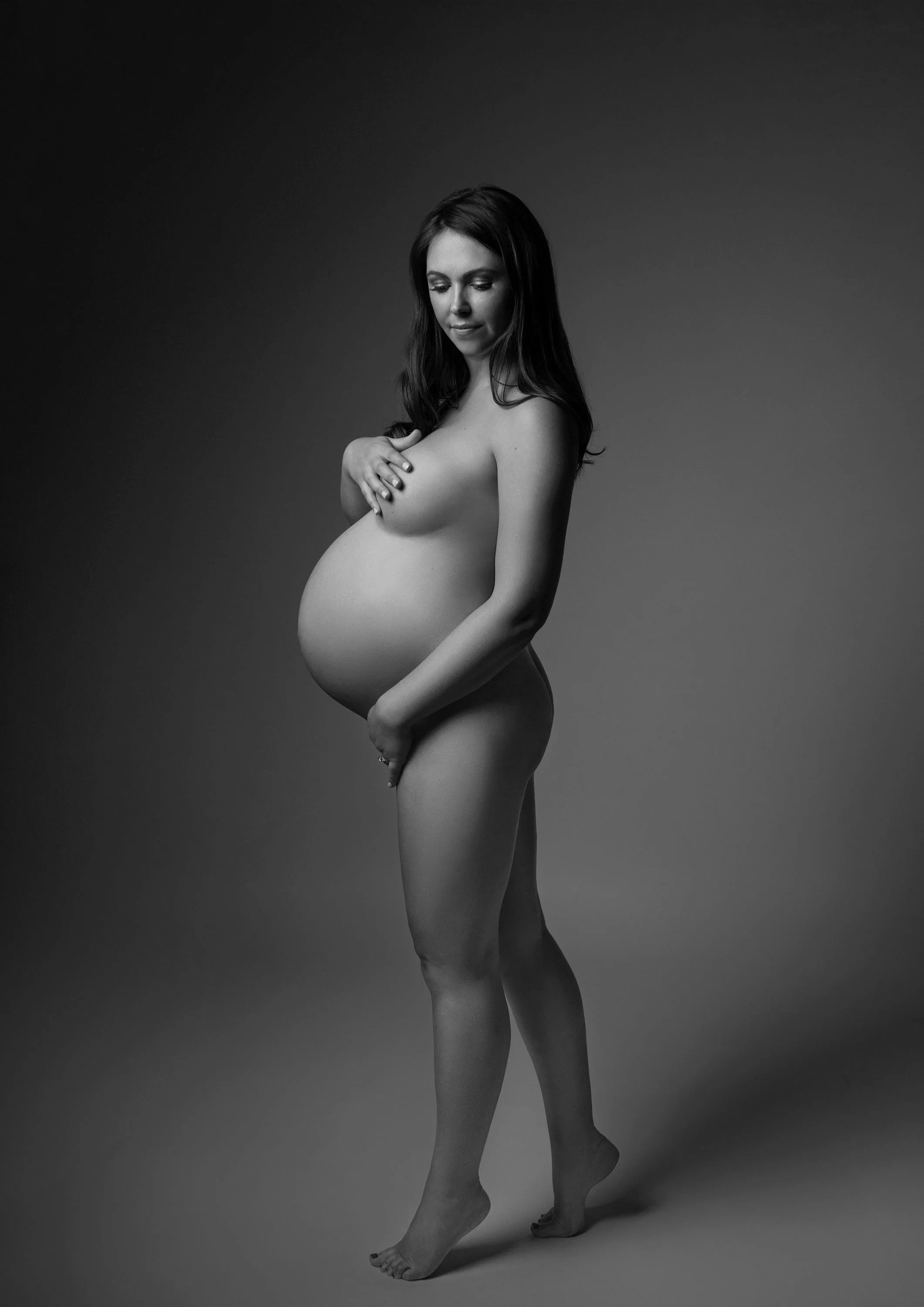 Sexy pregnancy photography by Nemi Miller - a specialist maternity photographer with a West London photography studio.