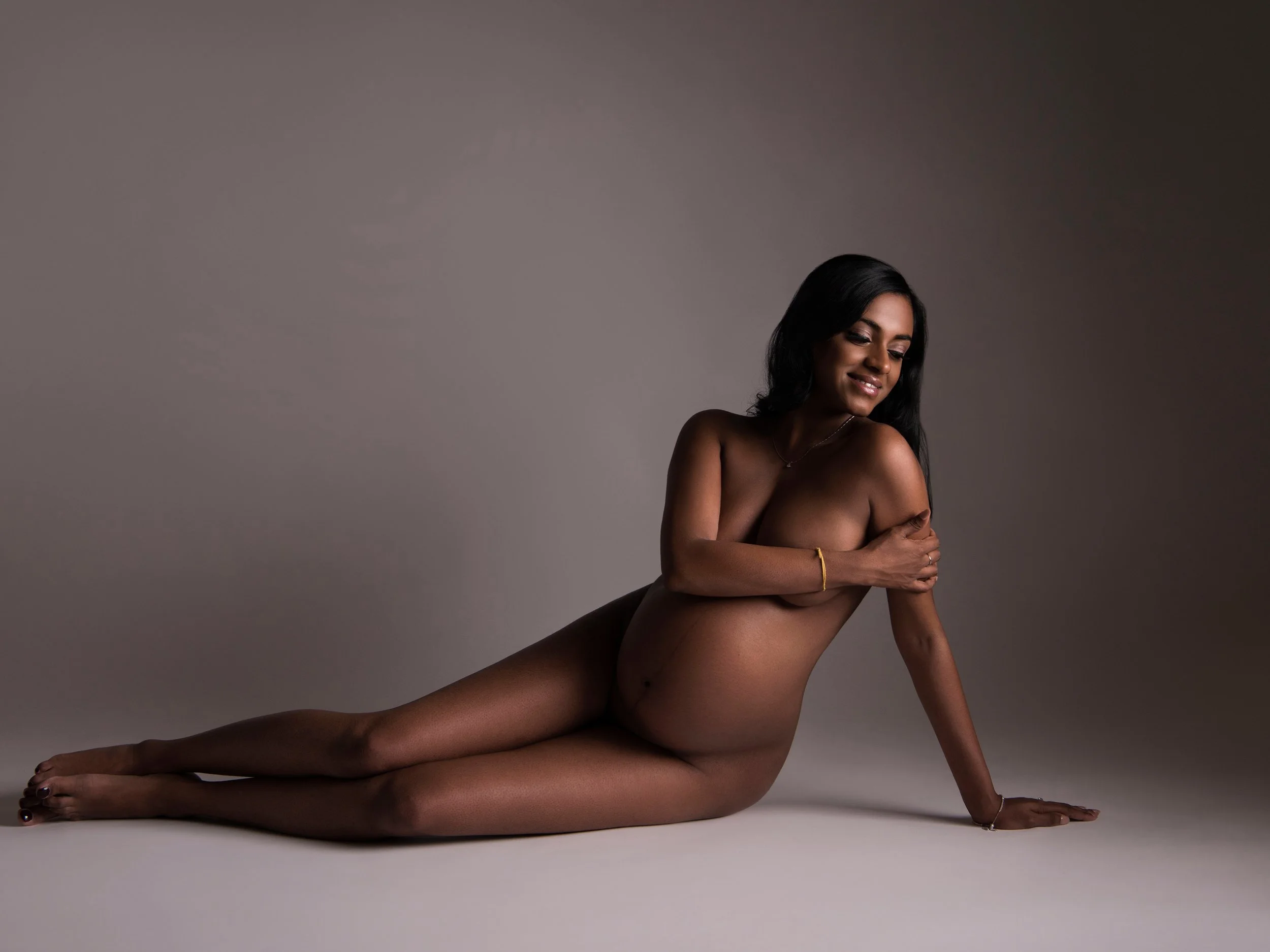 Nude maternity photography in a West London photography studio.