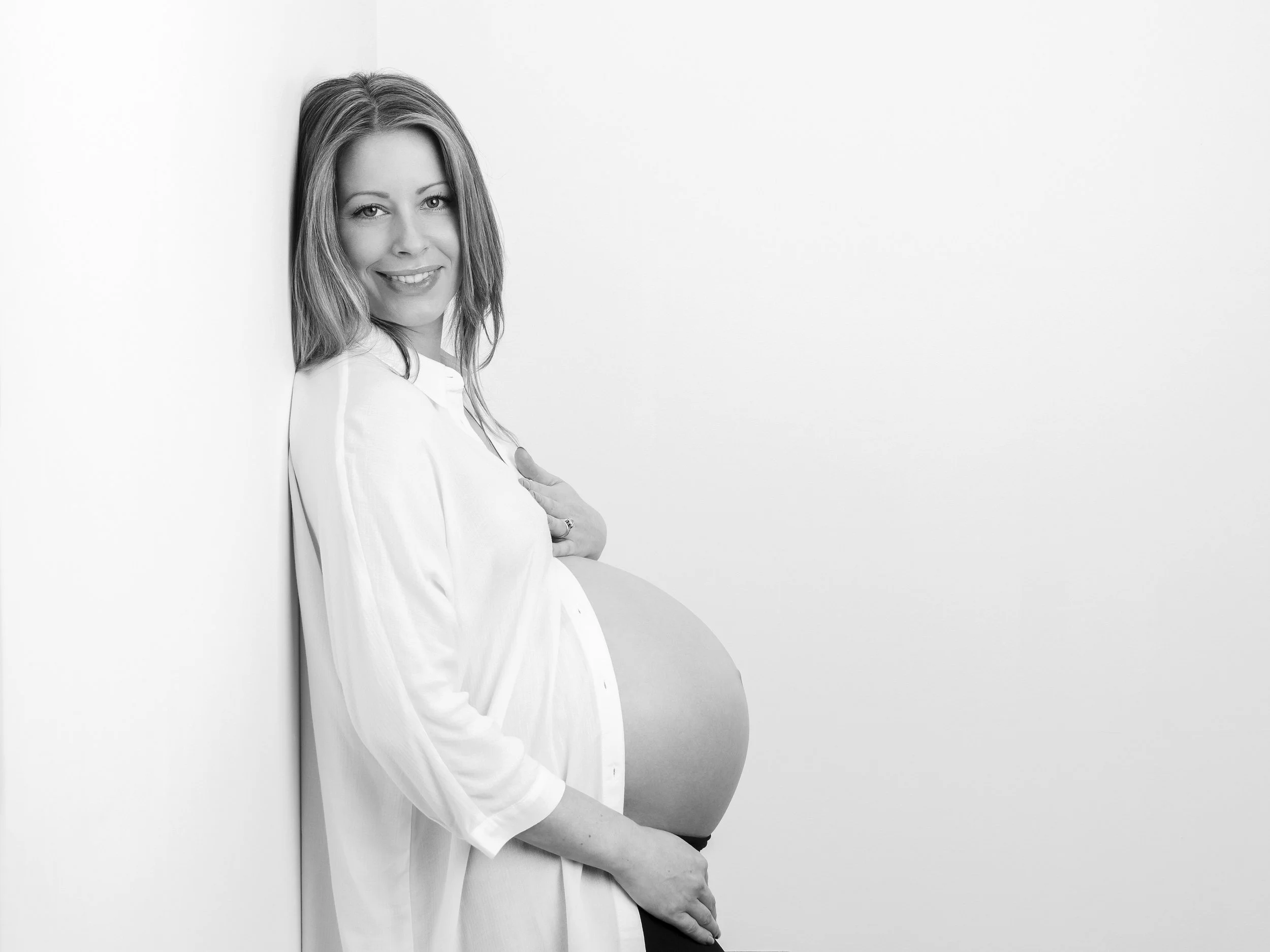 Black and white maternity photoshoot in Nemi's West London photography studio.