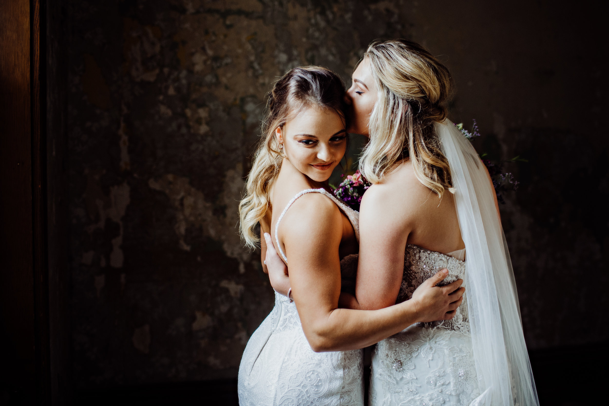  Lesbian wedding styled shoot at ohio state reformatory. wedding gowns. cincinnati wedding planner traveled to columbus. 