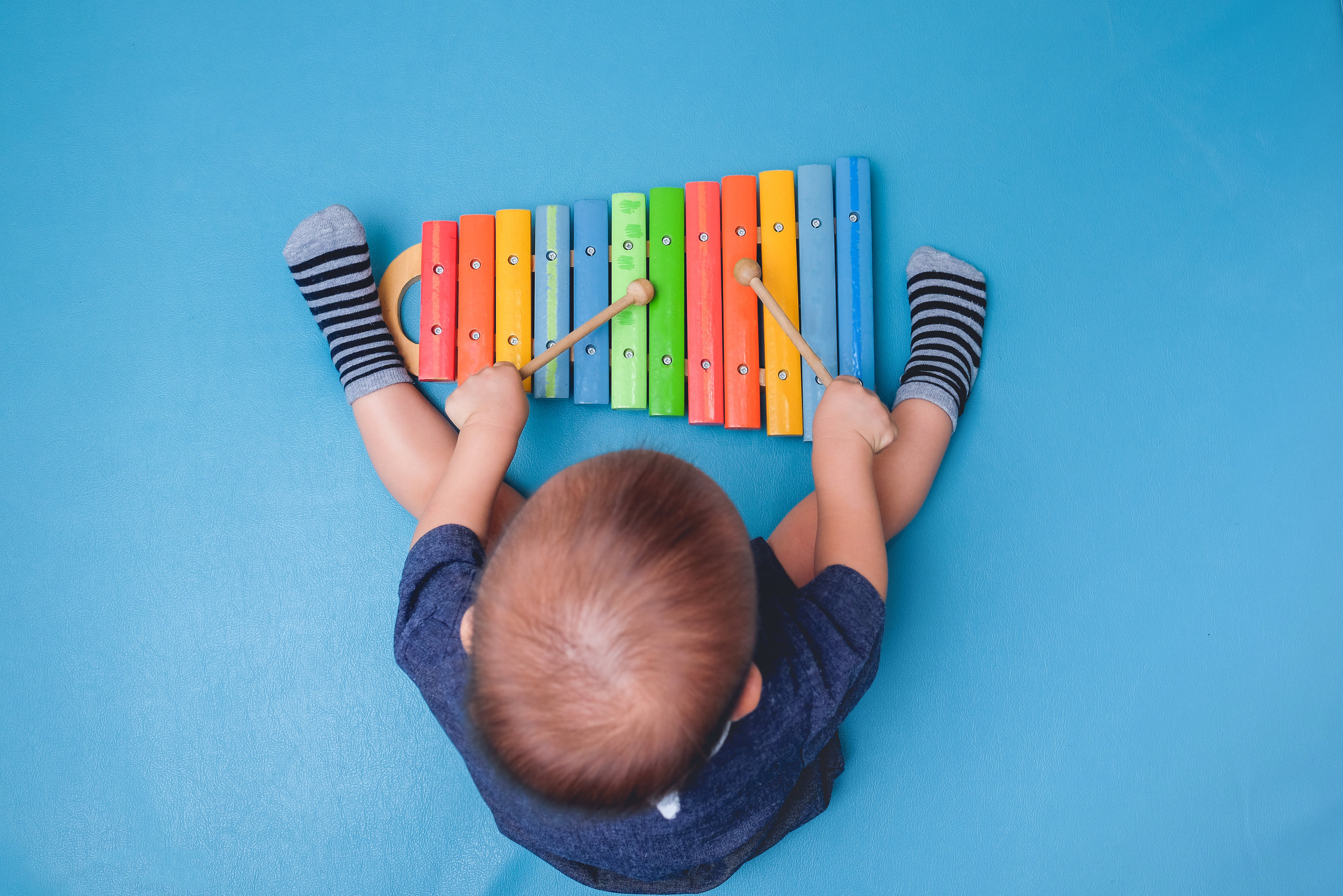 Infant on xylophone.jpg