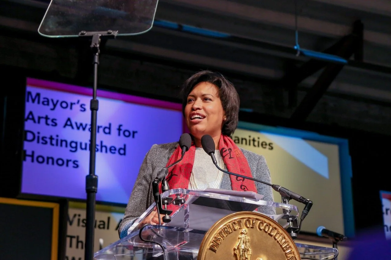 Mayor Muriel Bowser addresses the crowd while presenting the Mayor’s Arts Award for Distinguished Honor to Andy Shallal during the 34th Annual Mayor's Arts Awards at Union Market's Dock 5 on November 6, 2019. (Photo by Salah Djimbanaou, OCTFME)