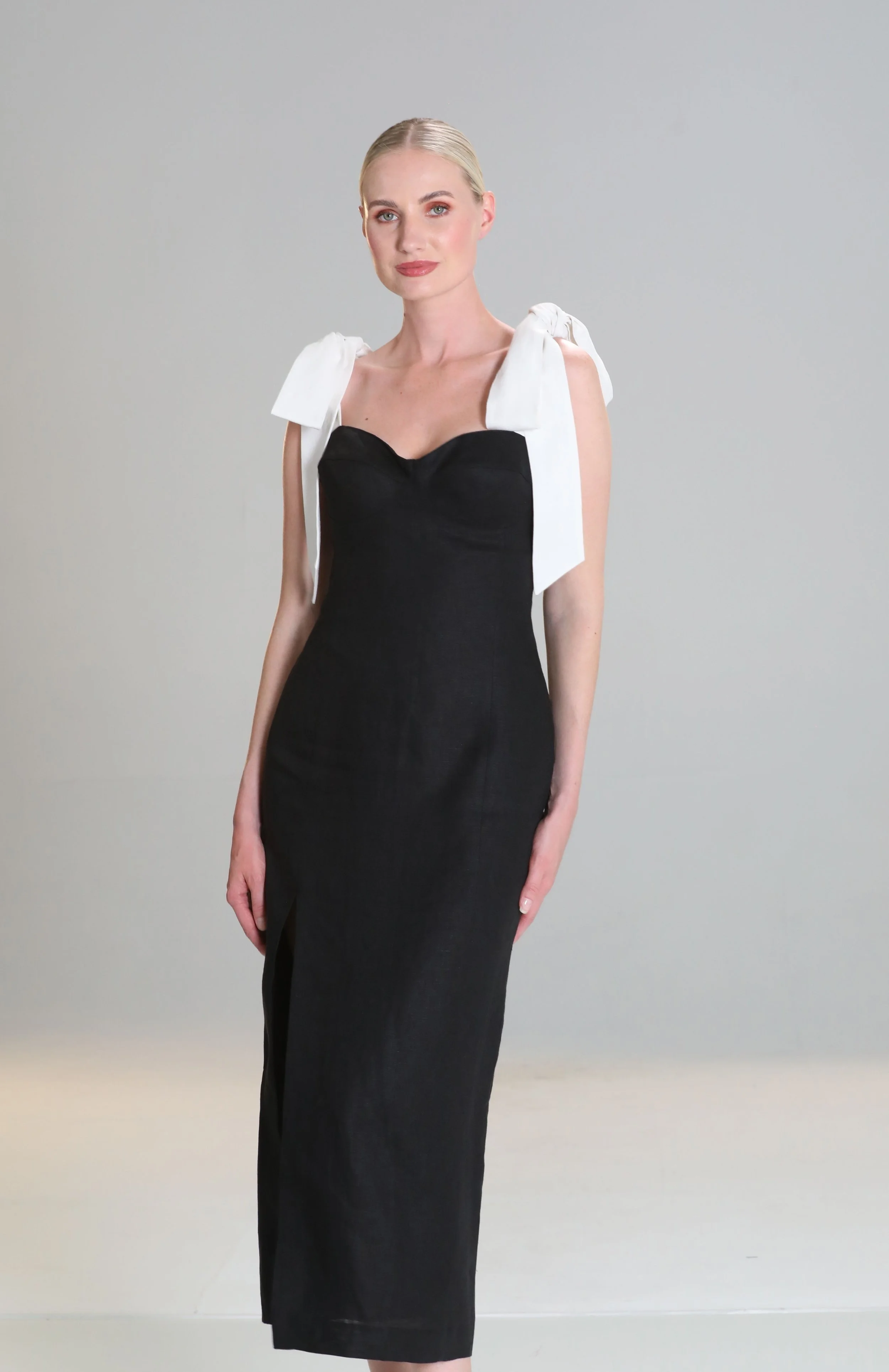 Charlotte+Lucas%2C+black+fitted+dress+with+contrast+bow+detail%2C+made+from+Irish+Linen%2C+%E2%82%AC650+%282%29.jpg