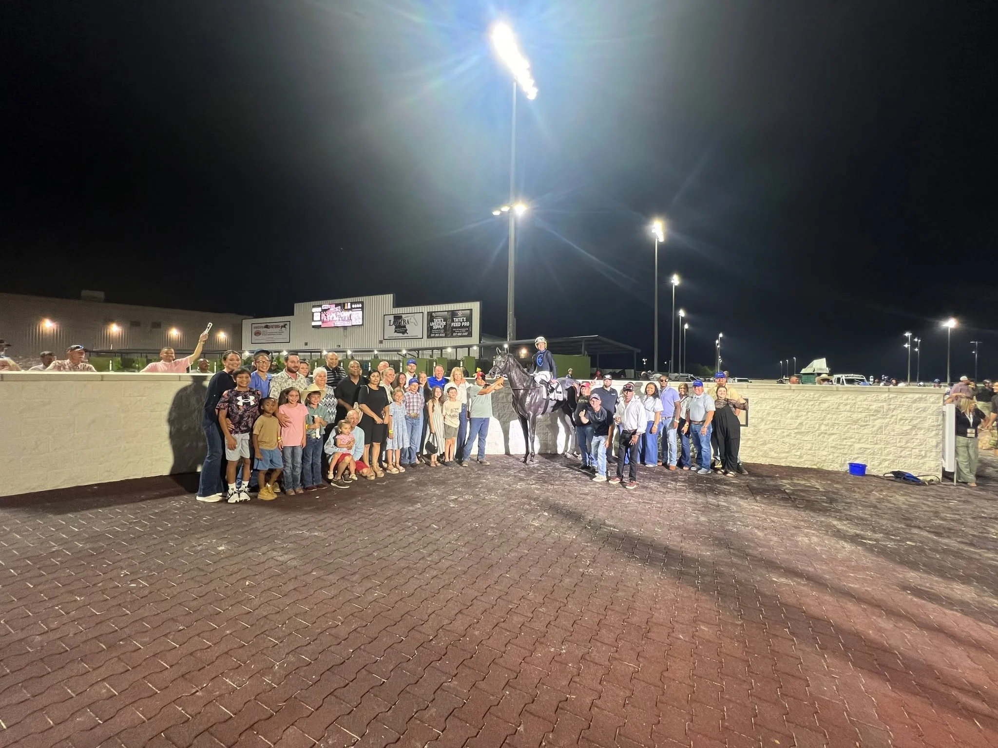 Team Coteau Grove Farms, family and friends filled the Winners Circle after Midnight Passion's win tonight at Evangeline Downs $100,000 LA Legends Soiree Stakes (1 mile). It was all the more special since the race was dedicated to legend Dale Angelle
