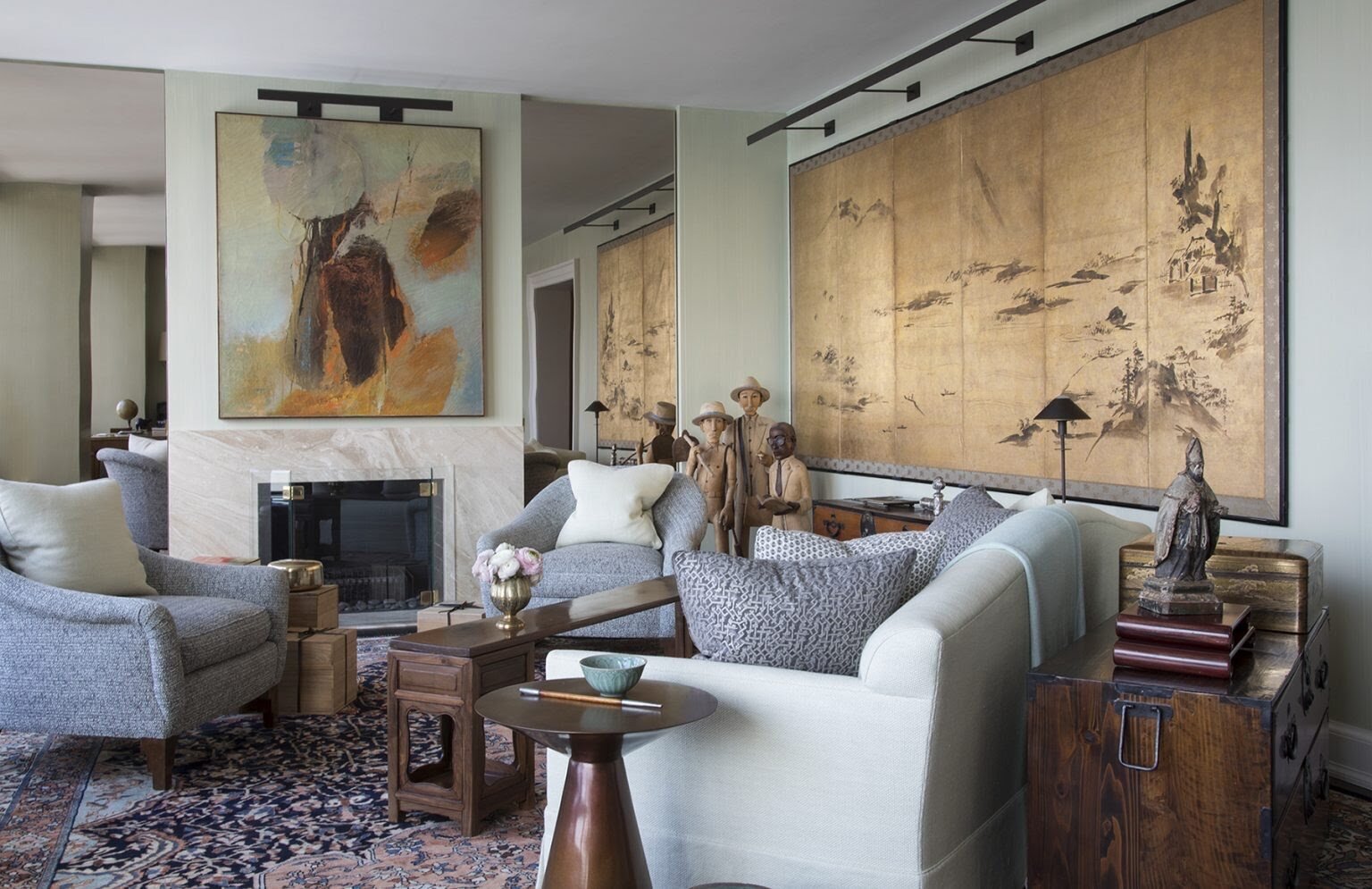  Isbell’s clients, whose townhouse he had previously done, are collectors who have had homes all over the globe. The designer pulled largely from their holdings when decorating the living room. Photo by Don Freeman 