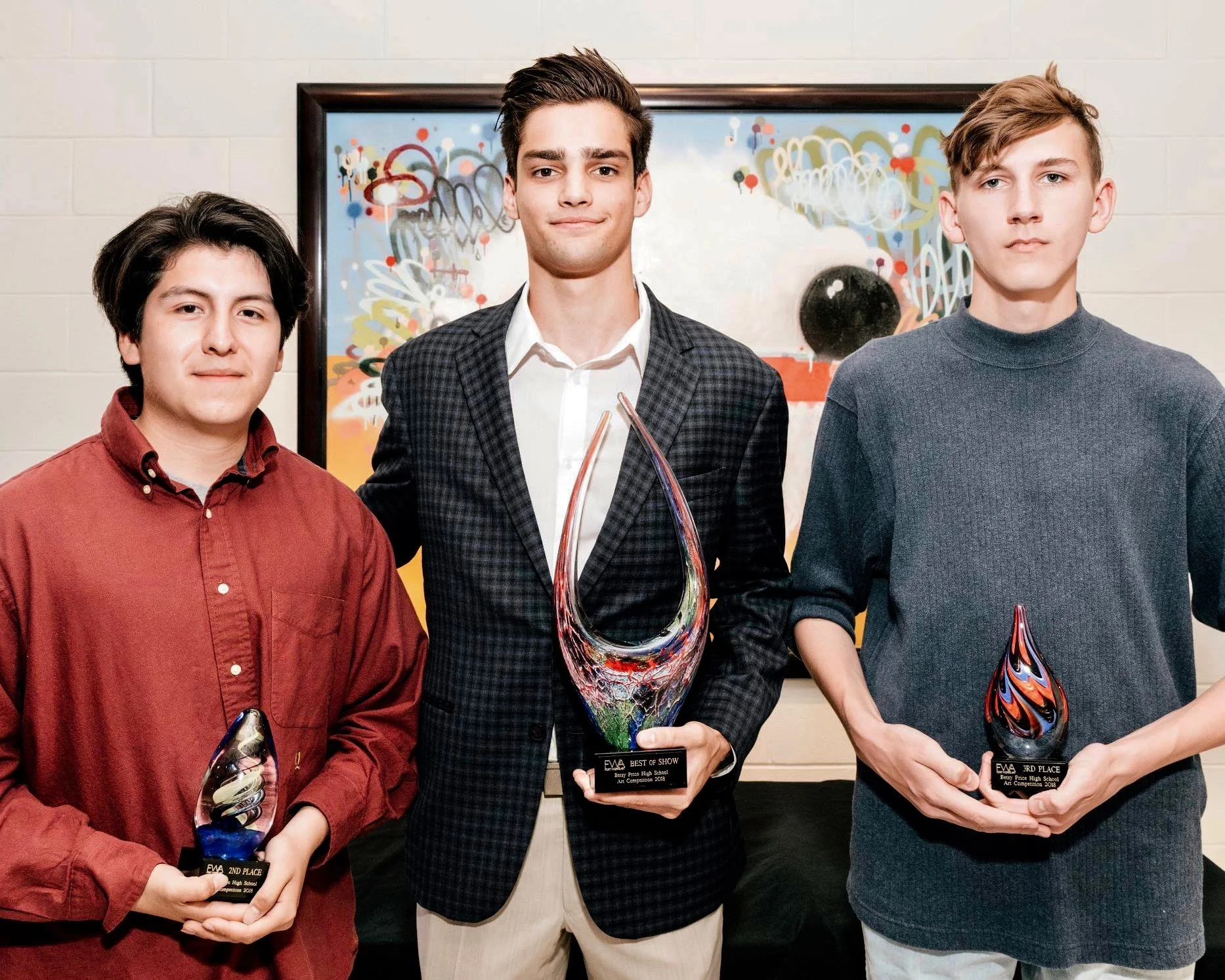 Winners of the 2018 Betsy Price Art Competition left to right: 2nd place winner Camilo Diaz, 1st place winner James Stupfel, 3rd place winner Will Deshazo