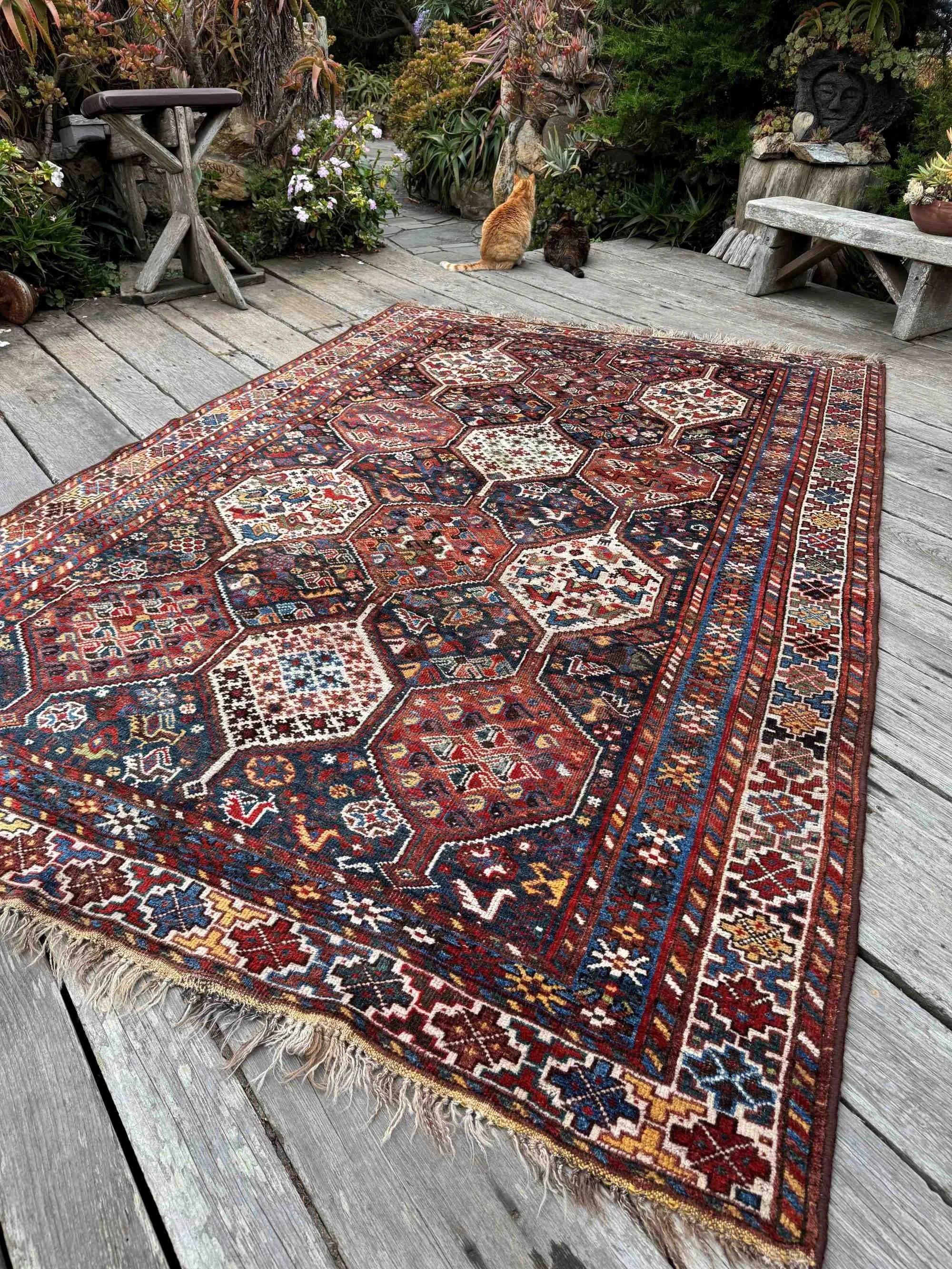 antique Khamseh tribal rugs