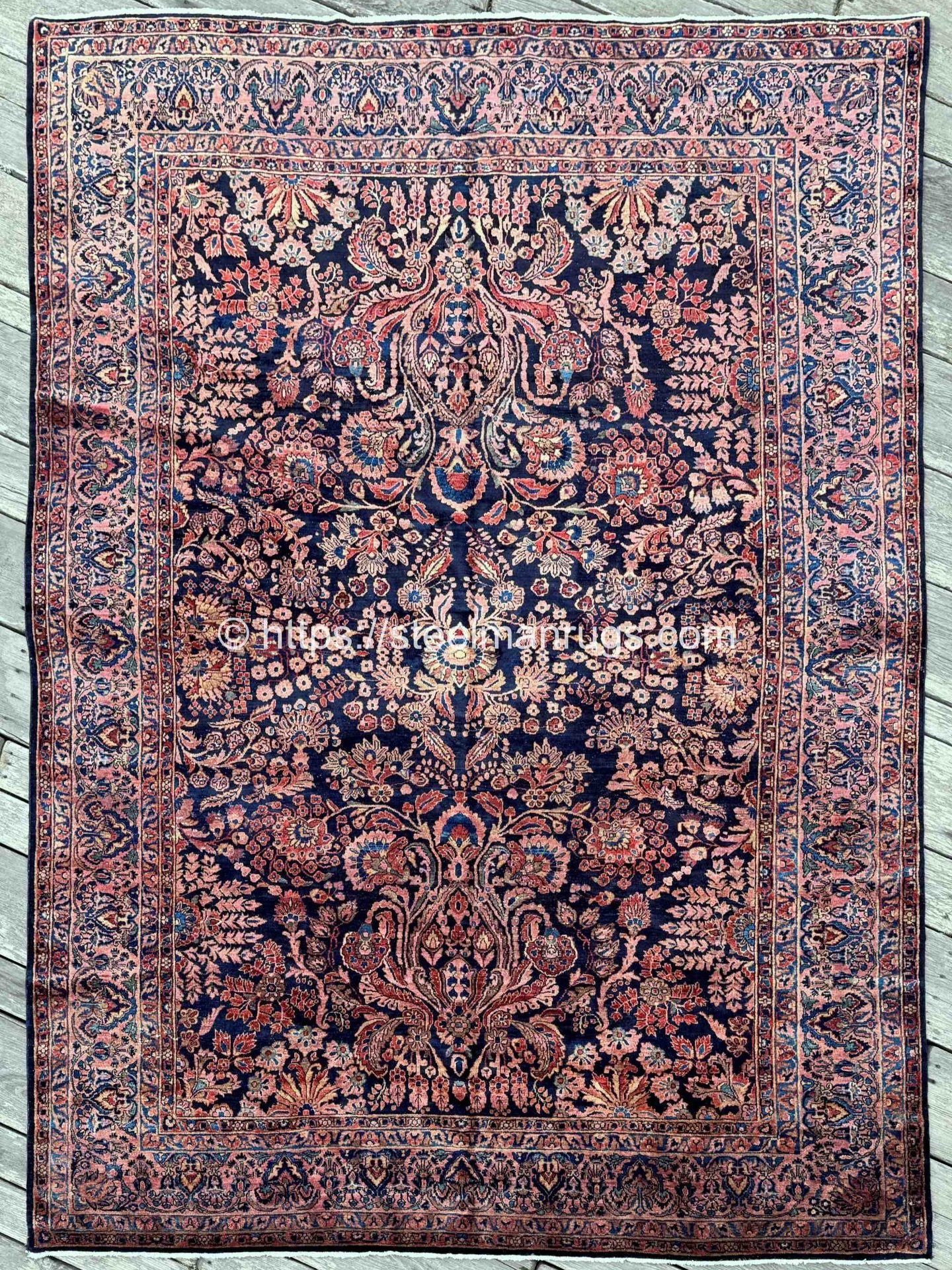 Antidote to the gloomy day 💙

Rug No. 26428

Antique Persian Sarouk rug with a sensuous floral garden design on a lustrous deep blue ground framed by an elegant rose pink border. The floral and botanical motifs are displayed in pale gold, mineral gr