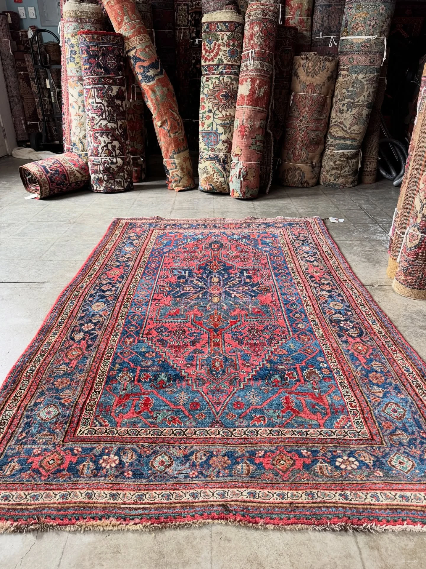 A beautiful antique Bidjar.

Rug No. 12380

Antique Persian Kurdish Bidjar village rug with an energetic tribal flavor in denim blue and coral pink. Freedom of expression and masterful color variegation (abrash) give this special rug a wonderful sens