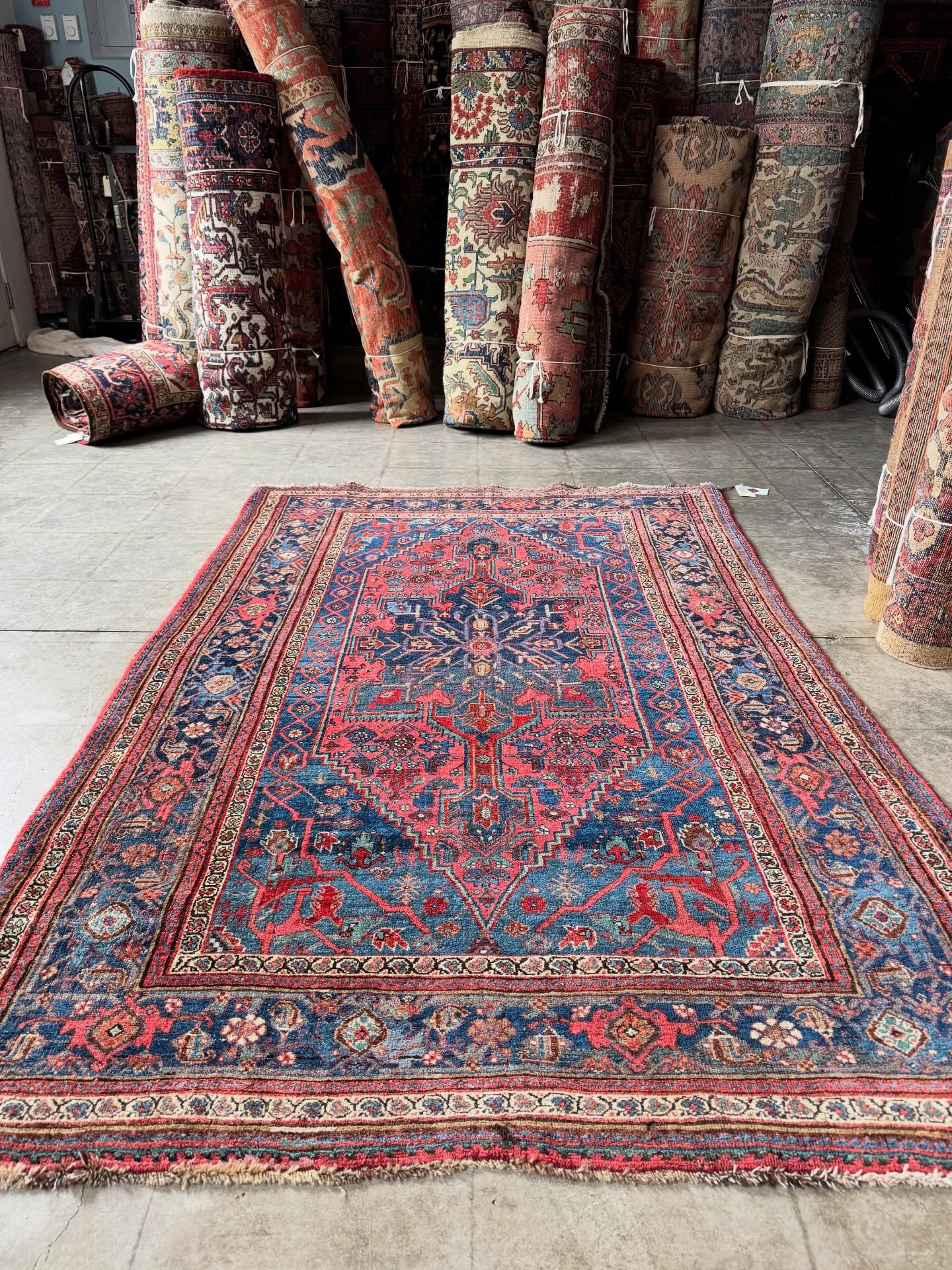 A beautiful antique Bidjar.

Rug No. 12380

Antique Persian Kurdish Bidjar village rug with an energetic tribal flavor in denim blue and coral pink. Freedom of expression and masterful color variegation (abrash) give this special rug a wonderful sens