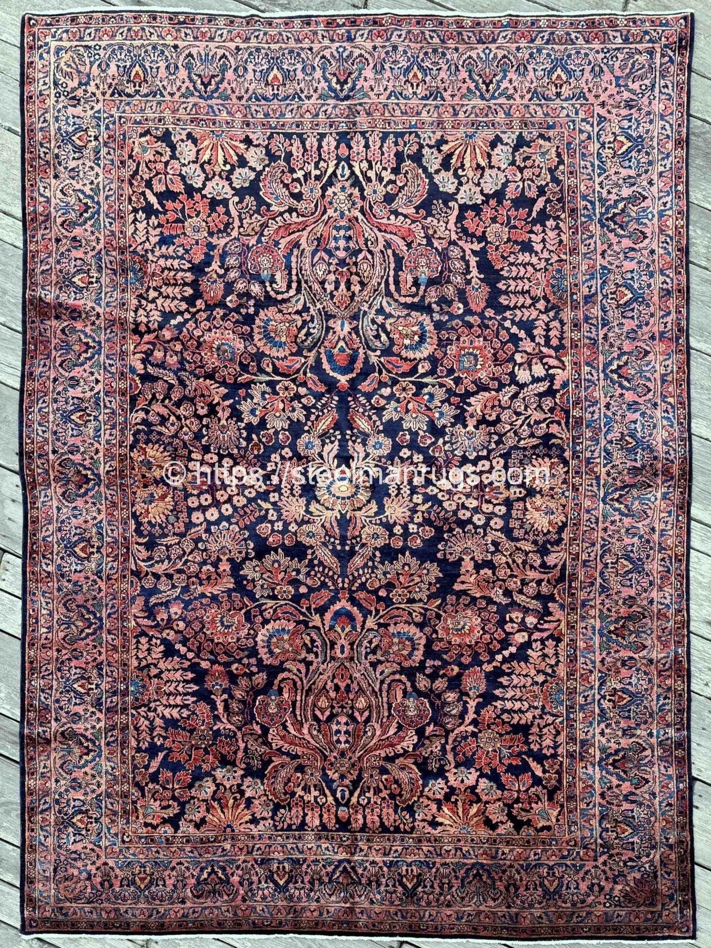 Antidote to the gloomy day 💙

Rug No. 26428

Antique Persian Sarouk rug with a sensuous floral garden design on a lustrous deep blue ground framed by an elegant rose pink border. The floral and botanical motifs are displayed in pale gold, mineral gr