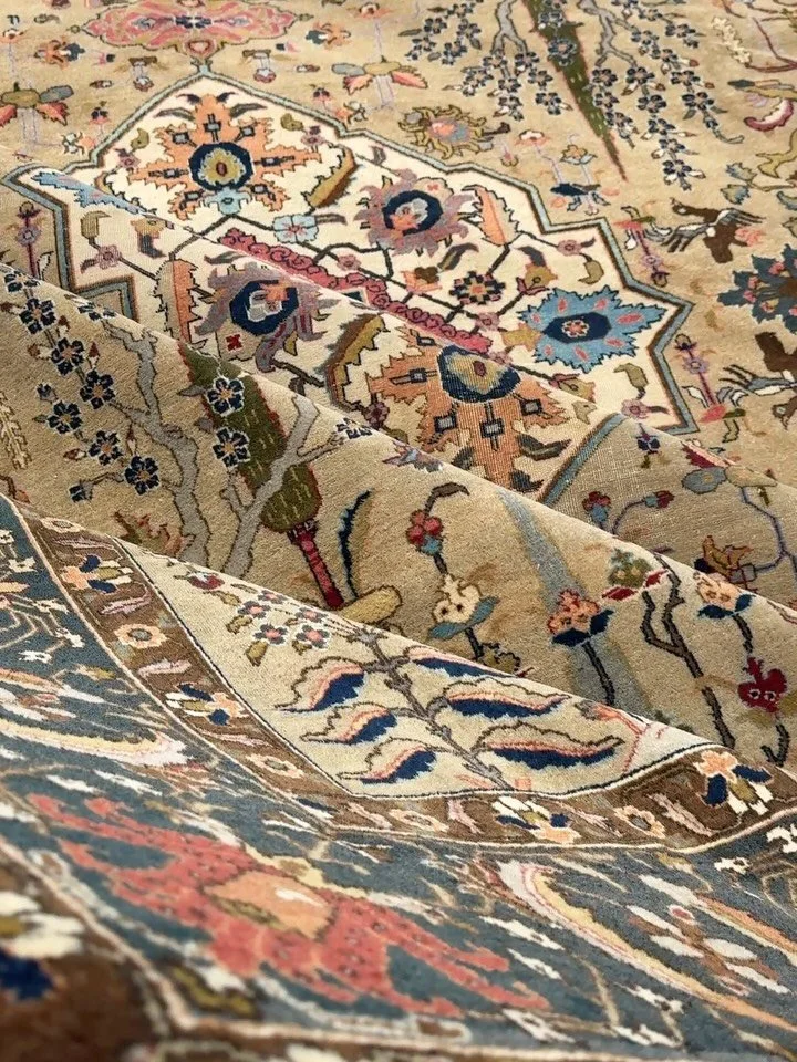 Feeling rather blessed to own this beautiful Tabriz. A magical paradise in the most insane color palette. The background is ecru. Very rare and is sure to sell out quickly. Size is 9&rsquo;4&rdquo;x11&rsquo;11&rdquo; in good condition. Dates to 1940-