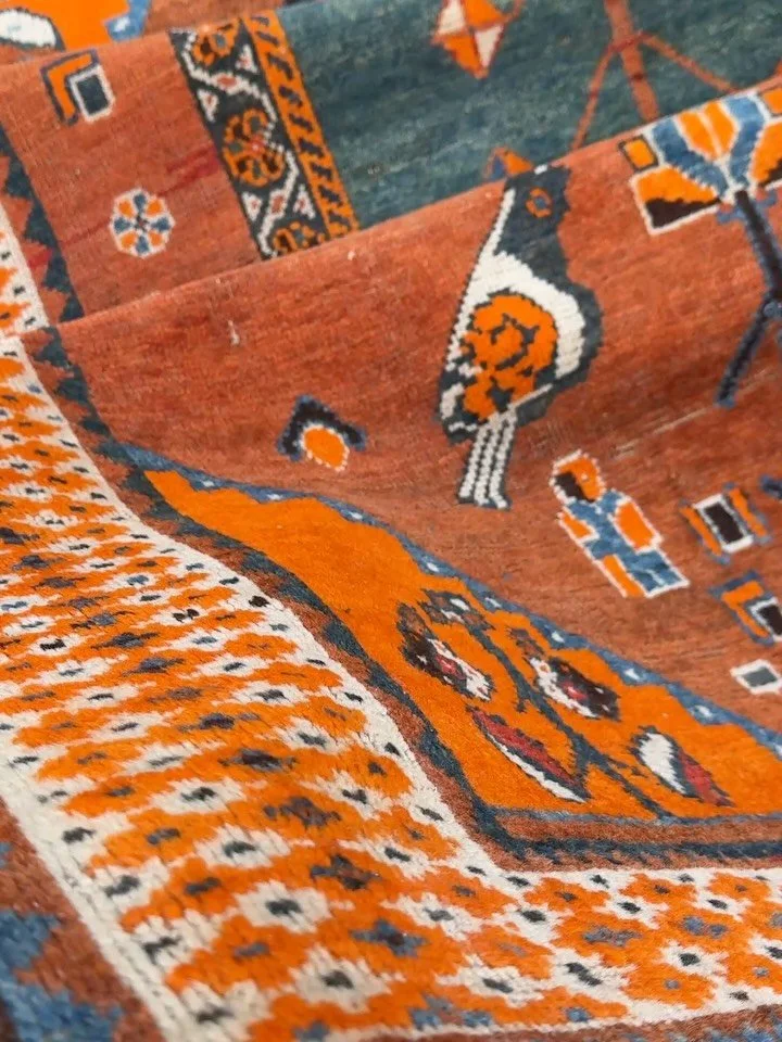 A very happy semi antique Persian Gabbeh. Mandarin orange, sea green, burnt orange, sky blue, and cream, with the cutest little birds. Size is 3&rsquo;9&rdquo;x6&rsquo;1&rdquo;. Please send a DM for details.