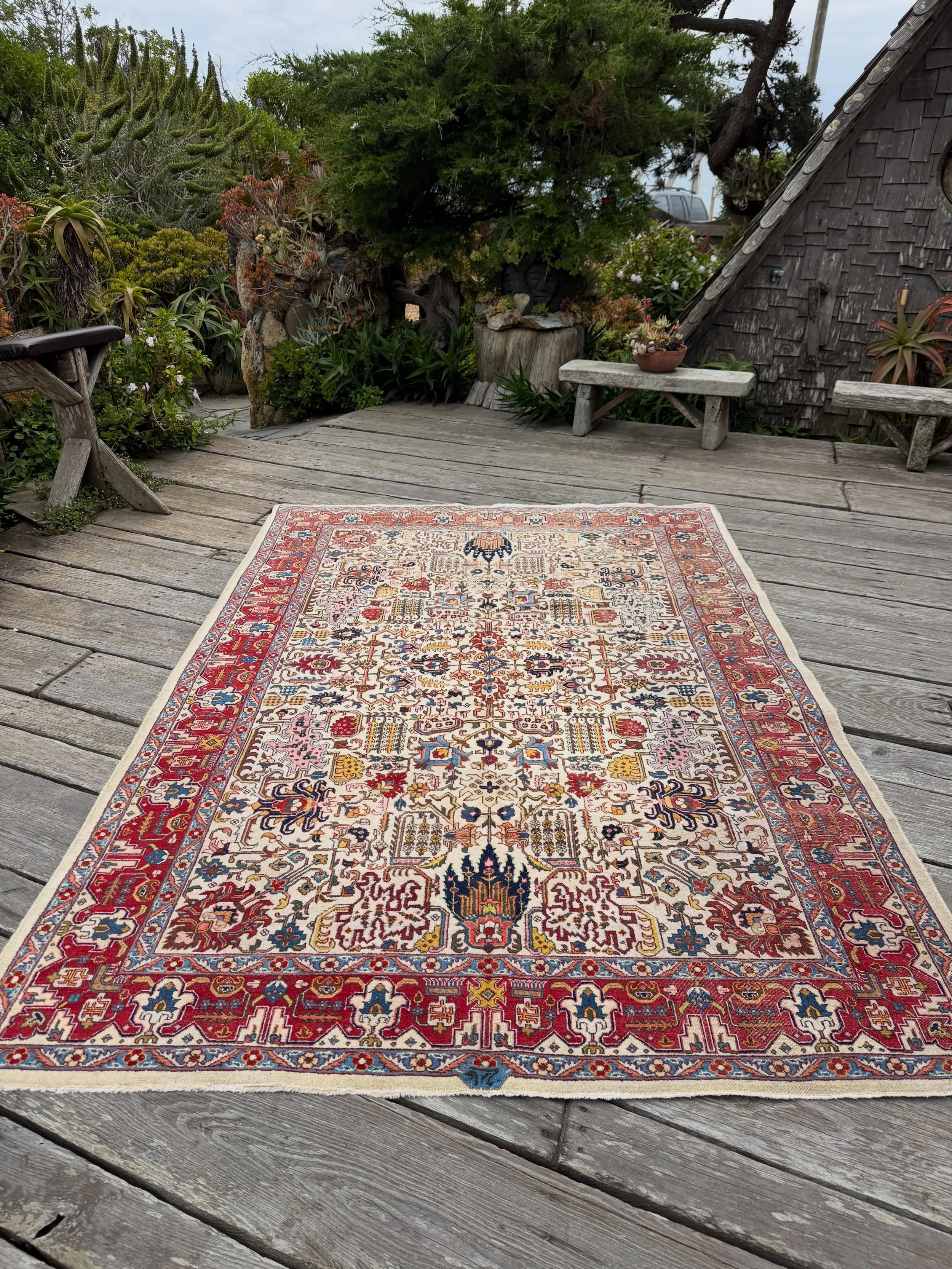 Worn and faded, but still ready to please. The ever popular stylized botanical garden on cream. This lovely, if well used, Tabriz dates to the mid 20th century and measures 6&rsquo;10&rdquo;x10&rsquo;0&rdquo;. Not expensive, just ask.
