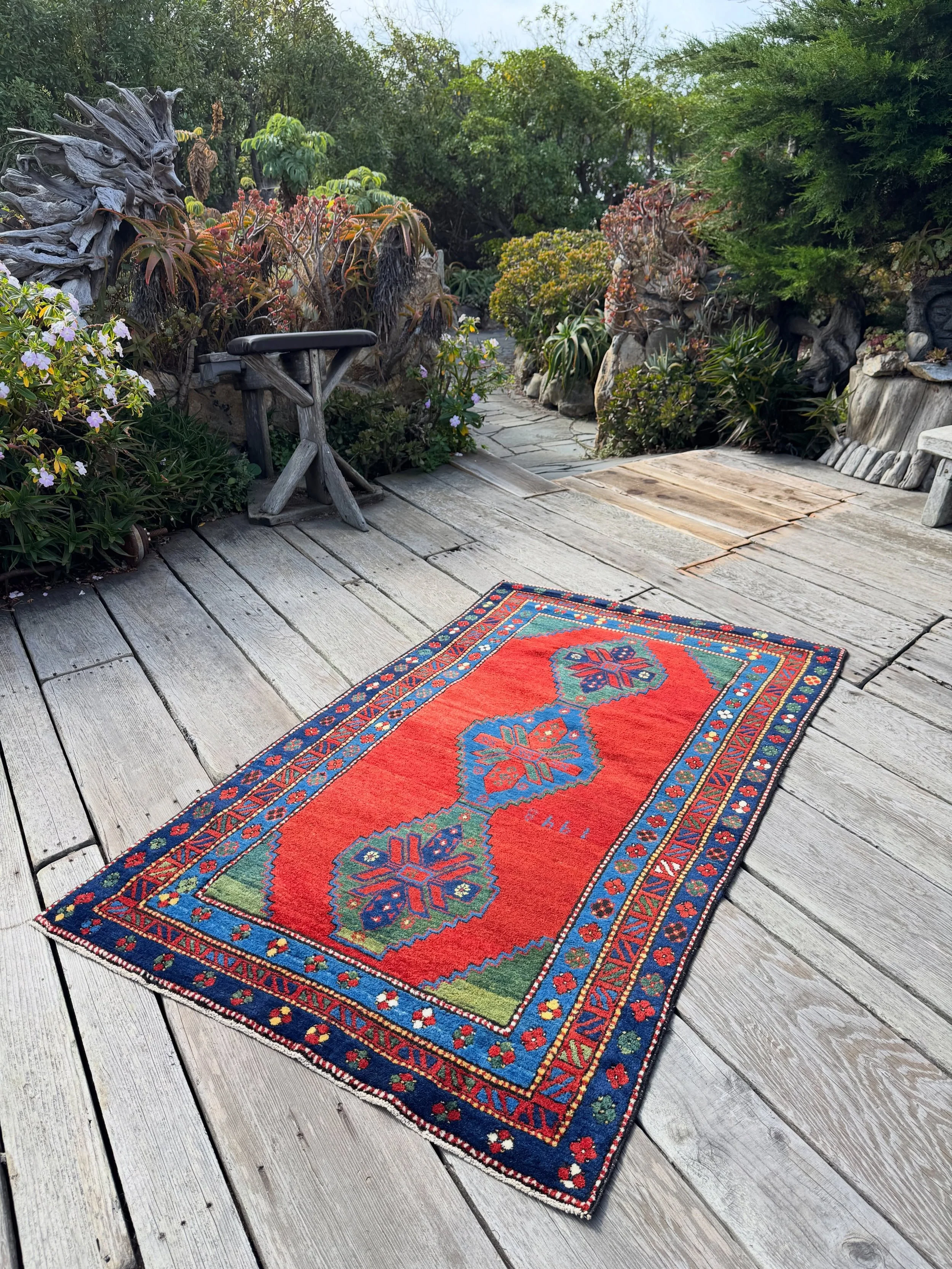 This luscious semi antique Armenian Karabagh rug was made in 1948. It must a prized possession because I don&rsquo;t think it has ever been used on the floor. Stunning madder red, emerald green, and Caribbean blue. Size is 4&rsquo;1&rdquo;x6&rsquo;9&