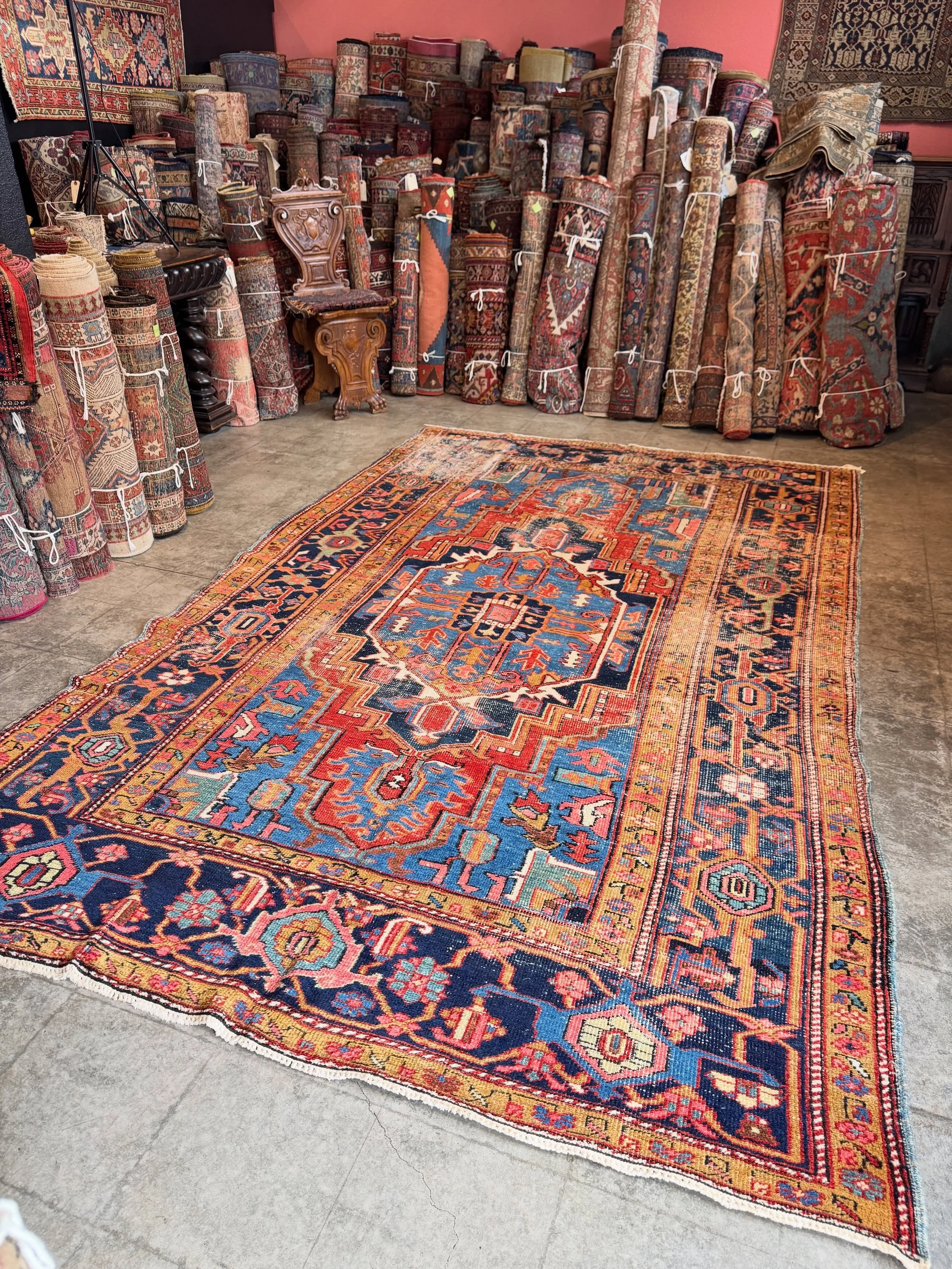 A fantastic Heriz rug that is well worn, but still gorgeous. Best colors and a lovely design. Size is 7&rsquo;0&rdquo;x11&rsquo;2&rdquo; and special price this weekend is $1500. Aside from the wear, you can see the is a square bald spot in the corner