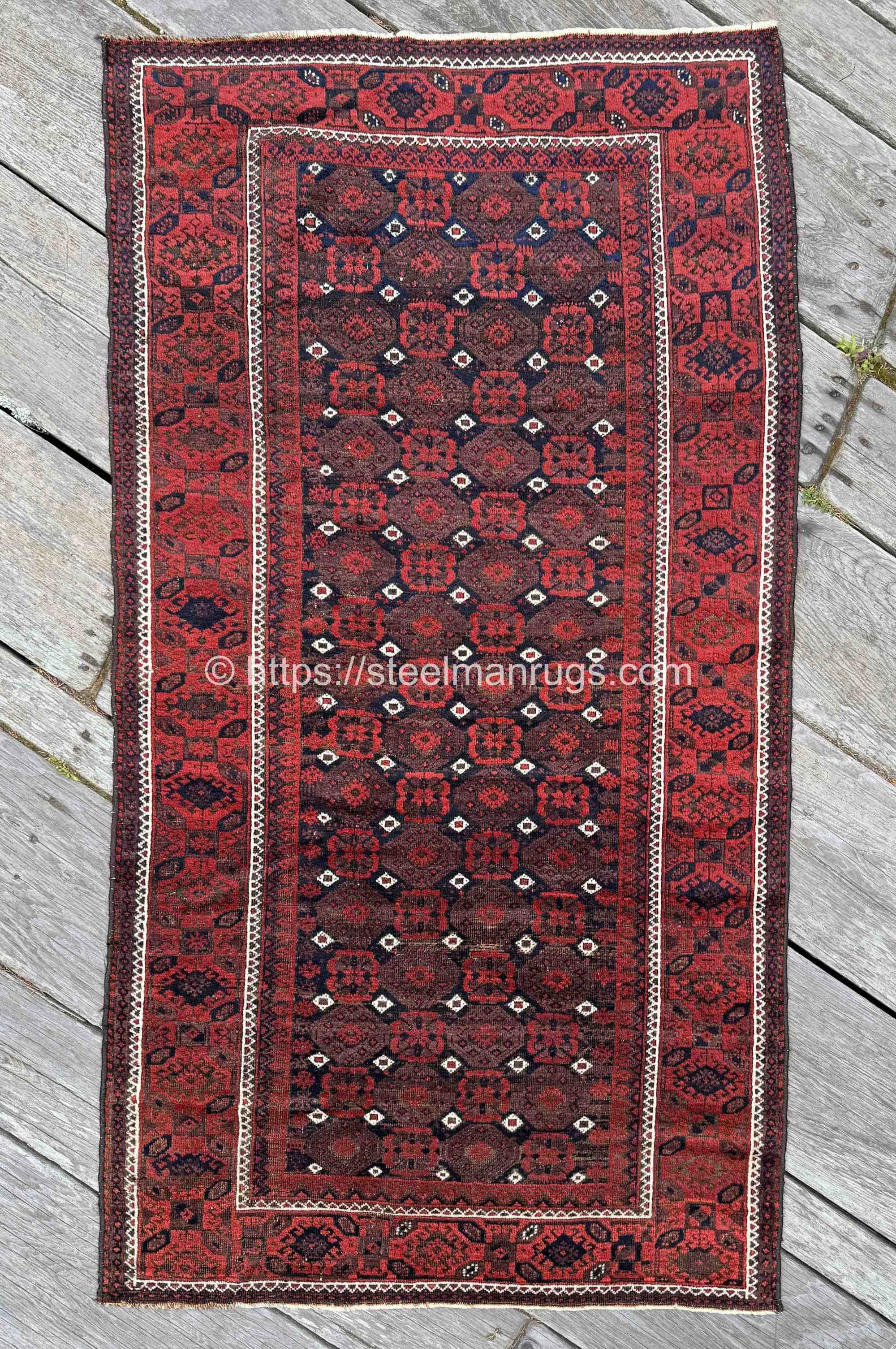 Antique Baluch Tribal Rug 3’5”x6’5” Ruby Red, Aubergine, and Indigo Mosaic