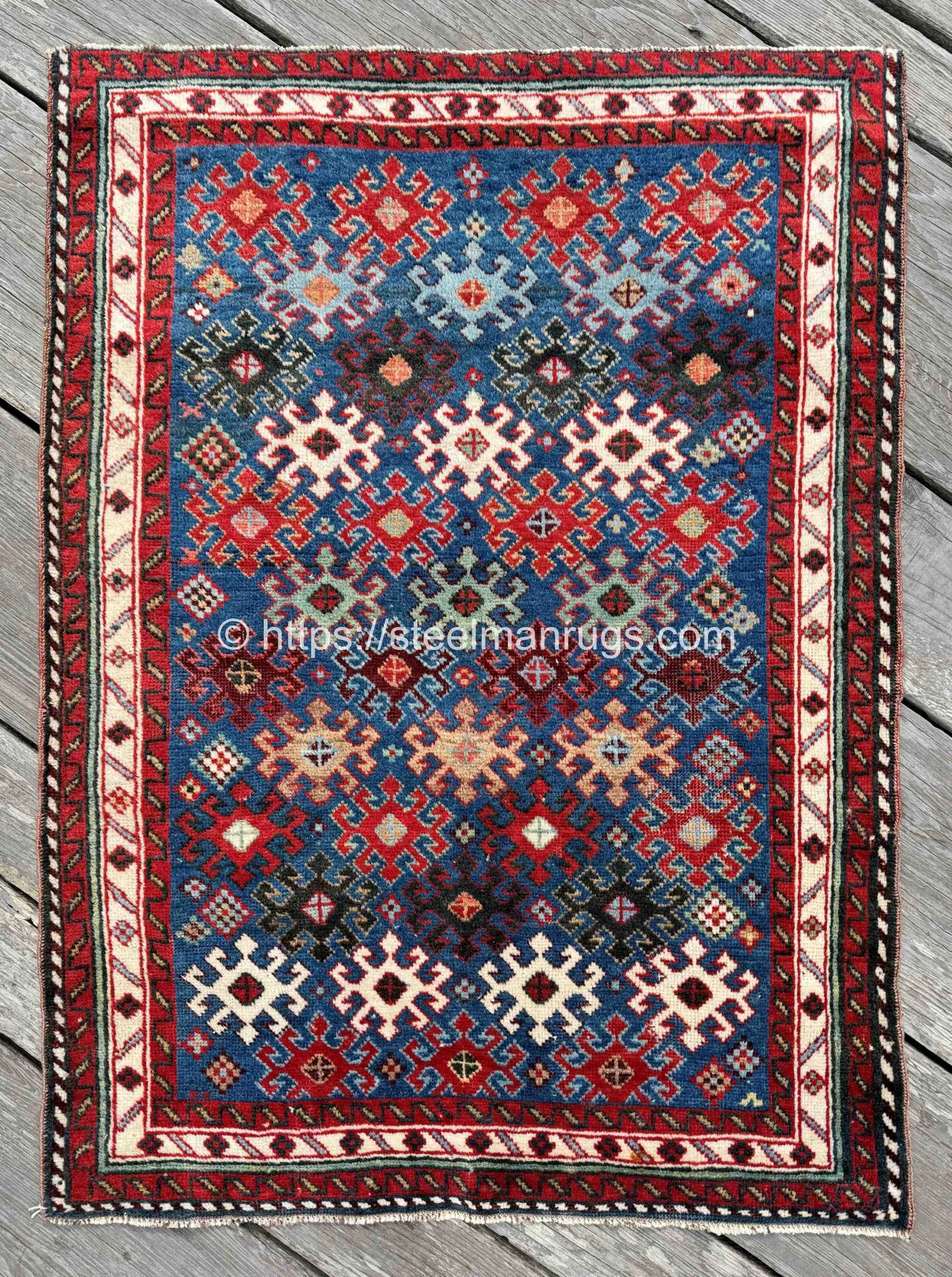 antique Caucasian Gendje Baku Kazak rug