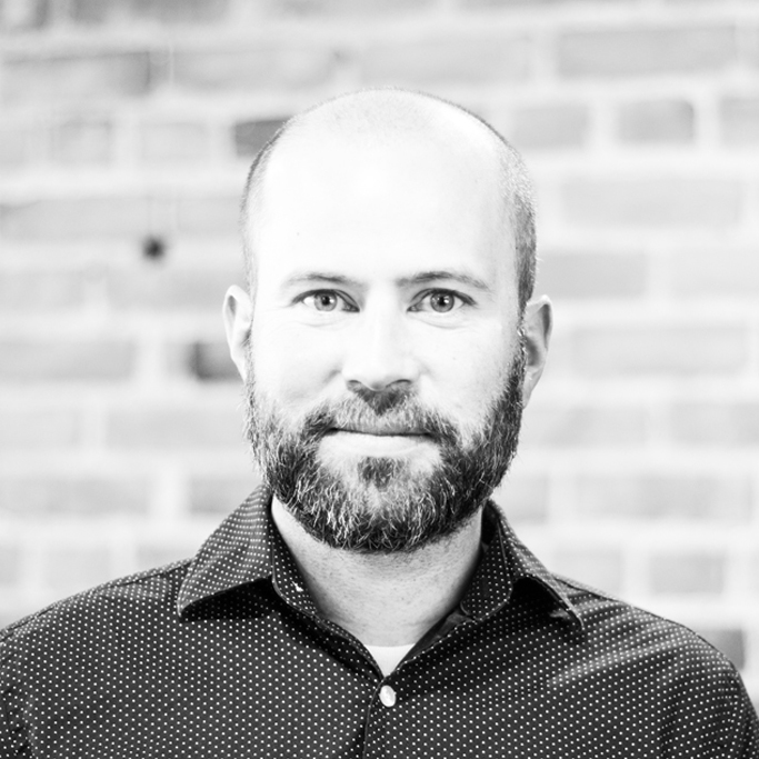 Casey-Half-Smile-BW.jpg