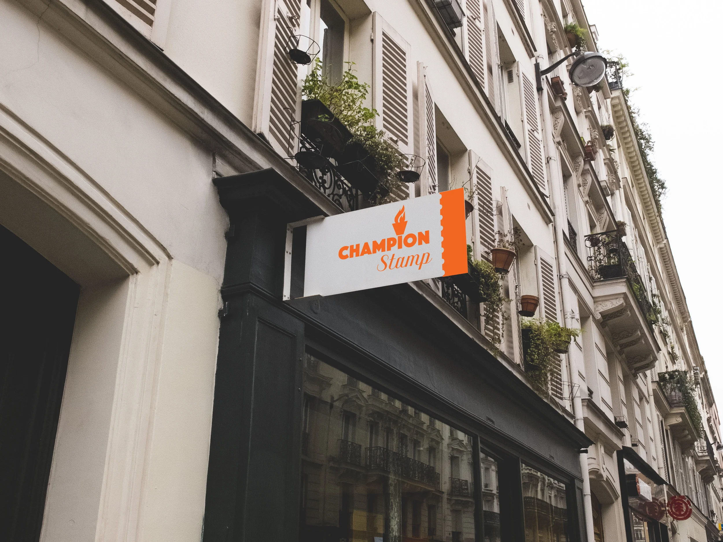 KNM_chmpStmp_storesign_WEB.jpg