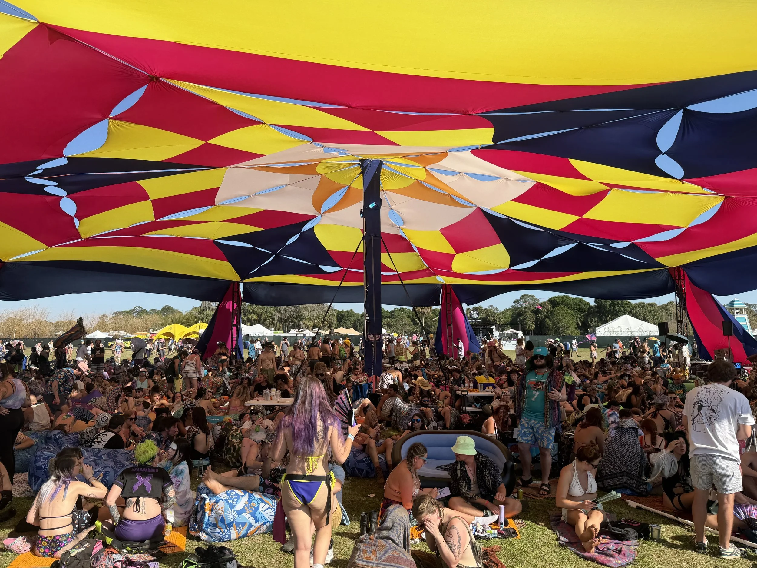 Beating the heat crowd all under the shade structure Okeechobee music festival 2026