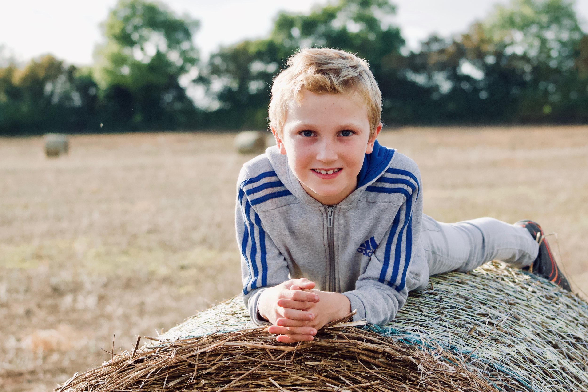 My eldest happily posing in a local crop field, South Gloucestershire.