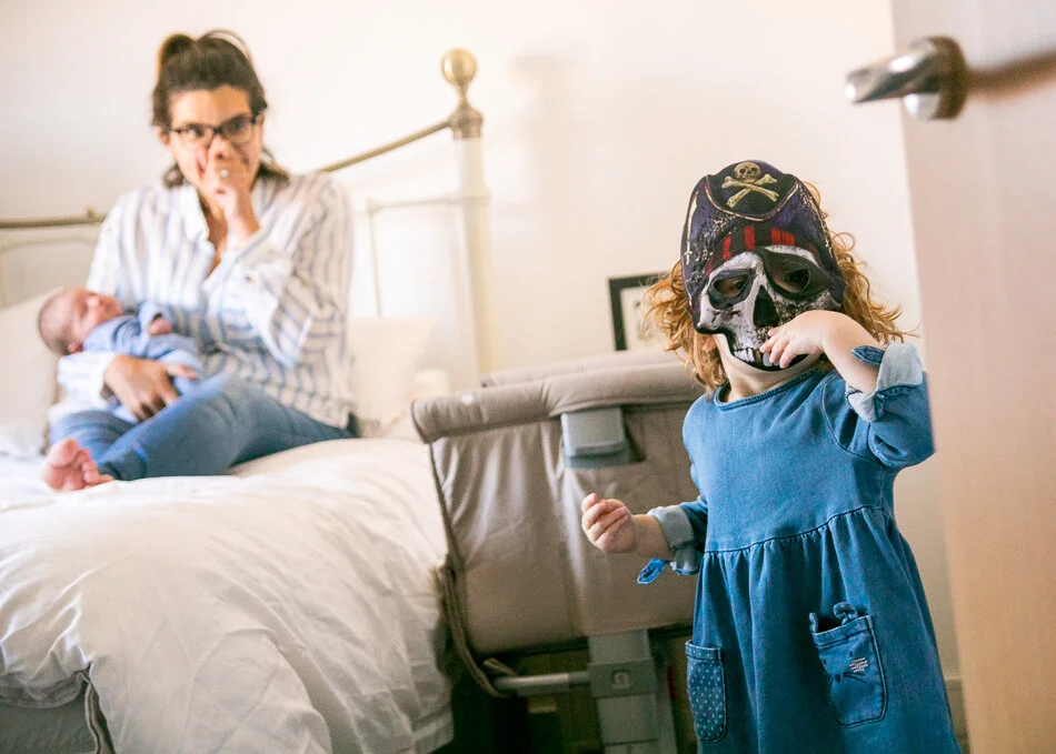 Fun at home during a newborn documentary session.