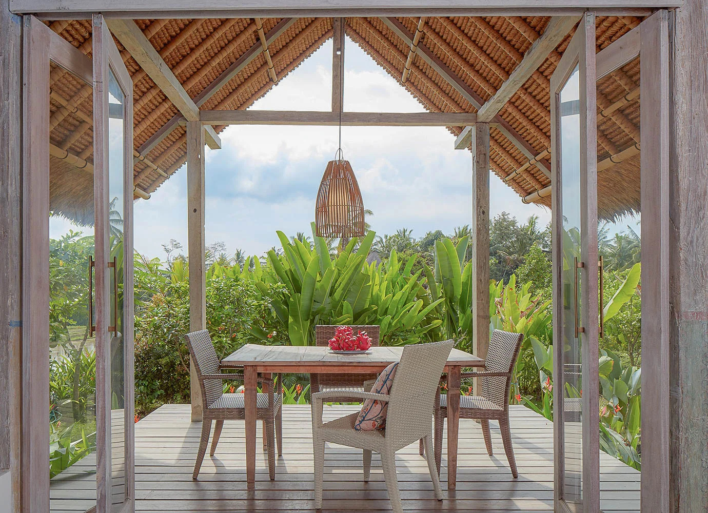 tropical indoor outdoor dining room