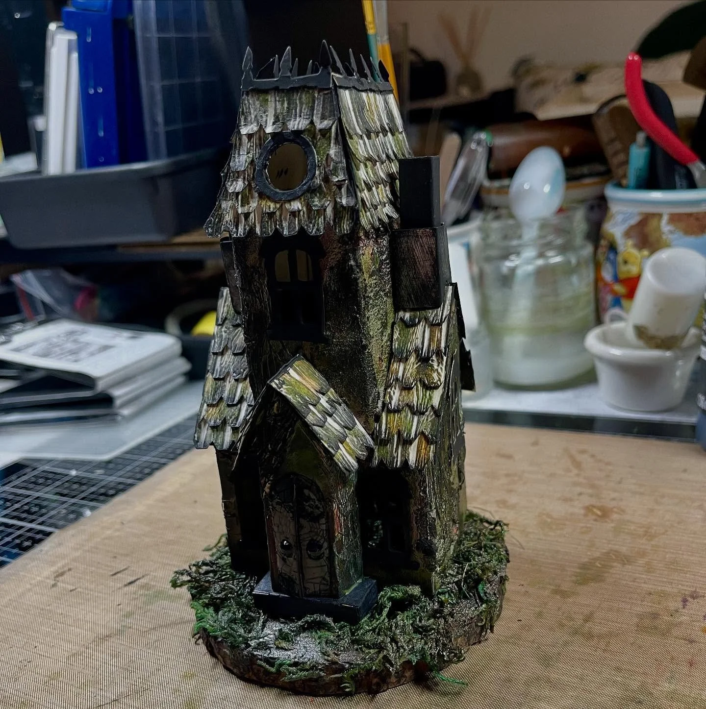 I wanted to refresh my memory on how to make the haunted mansion from Tim Holtz&rsquo;s original village set, so I decided to try @shariartcarroll version. I used scraps of file folders to get started and wow&mdash;this was so much fun! In the end I 