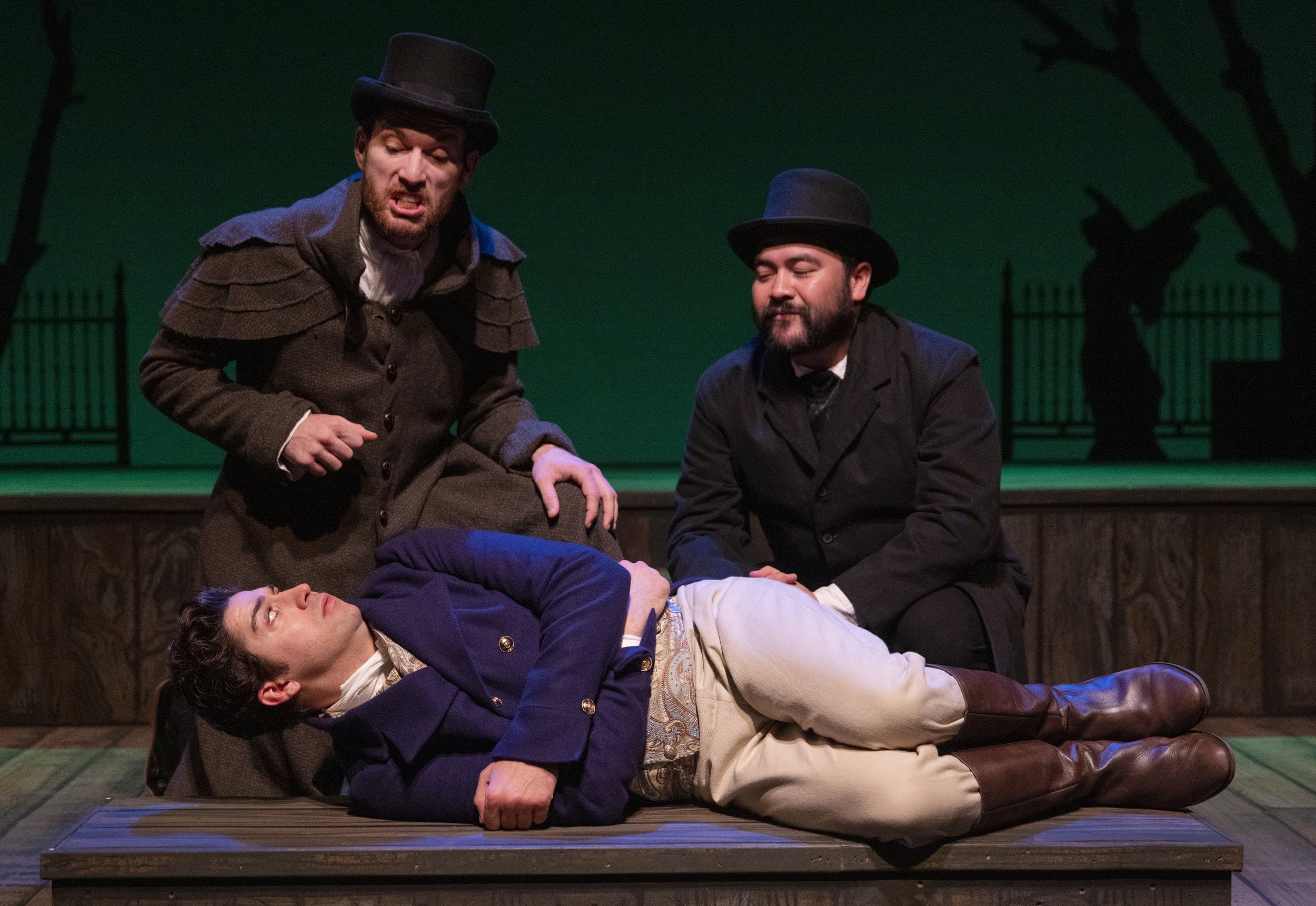 Hunter Hnat as Pip with Christopher Pankratz and Lucas Gonzales as Debt Collectors. Photo by Tim Fuller.