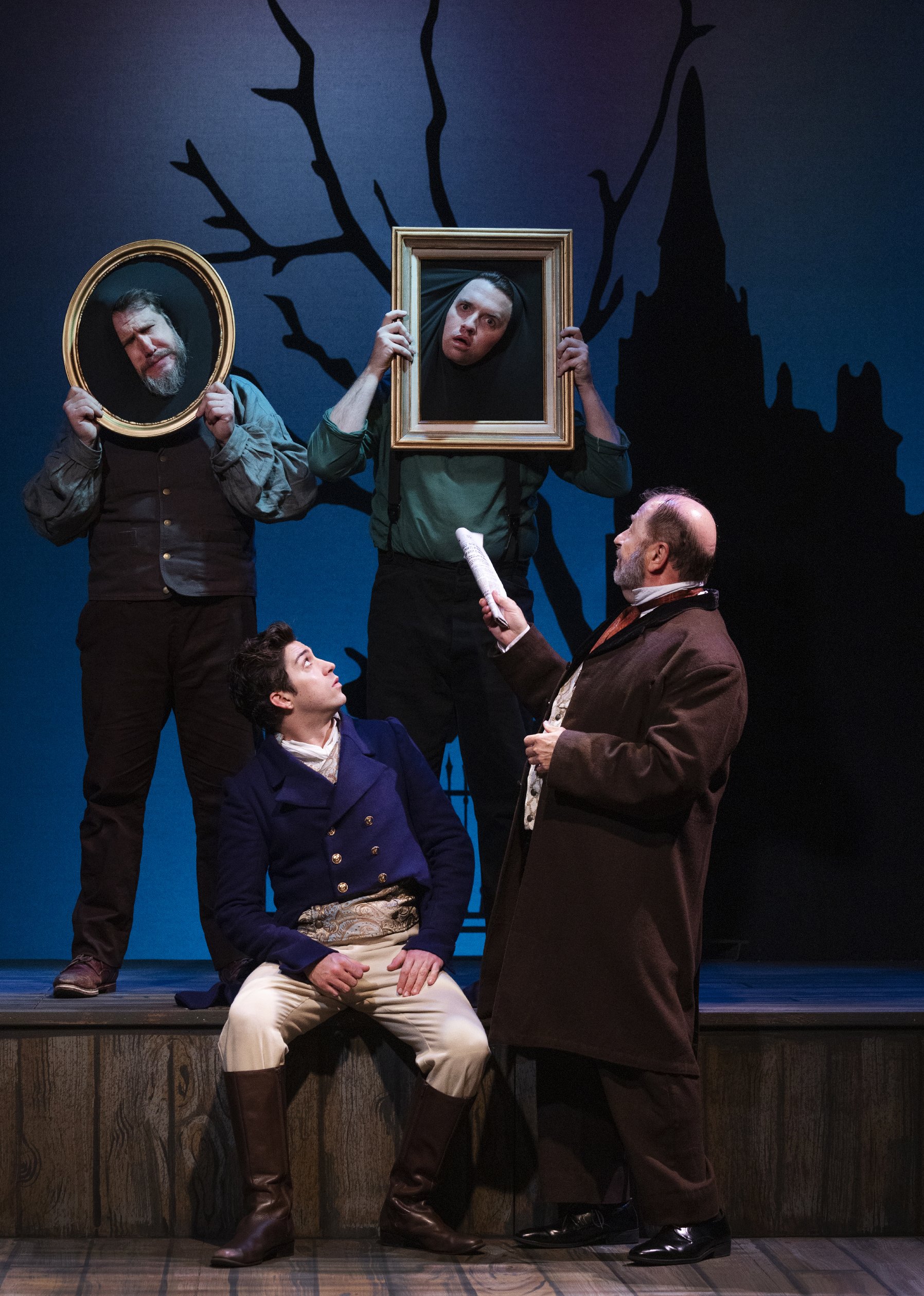 Hunter Hnat as Pip, Dennis O’Dell as Wemmick, and Matt Walley and Aaron Shand as Death Masks. Photo by Tim Fuller.