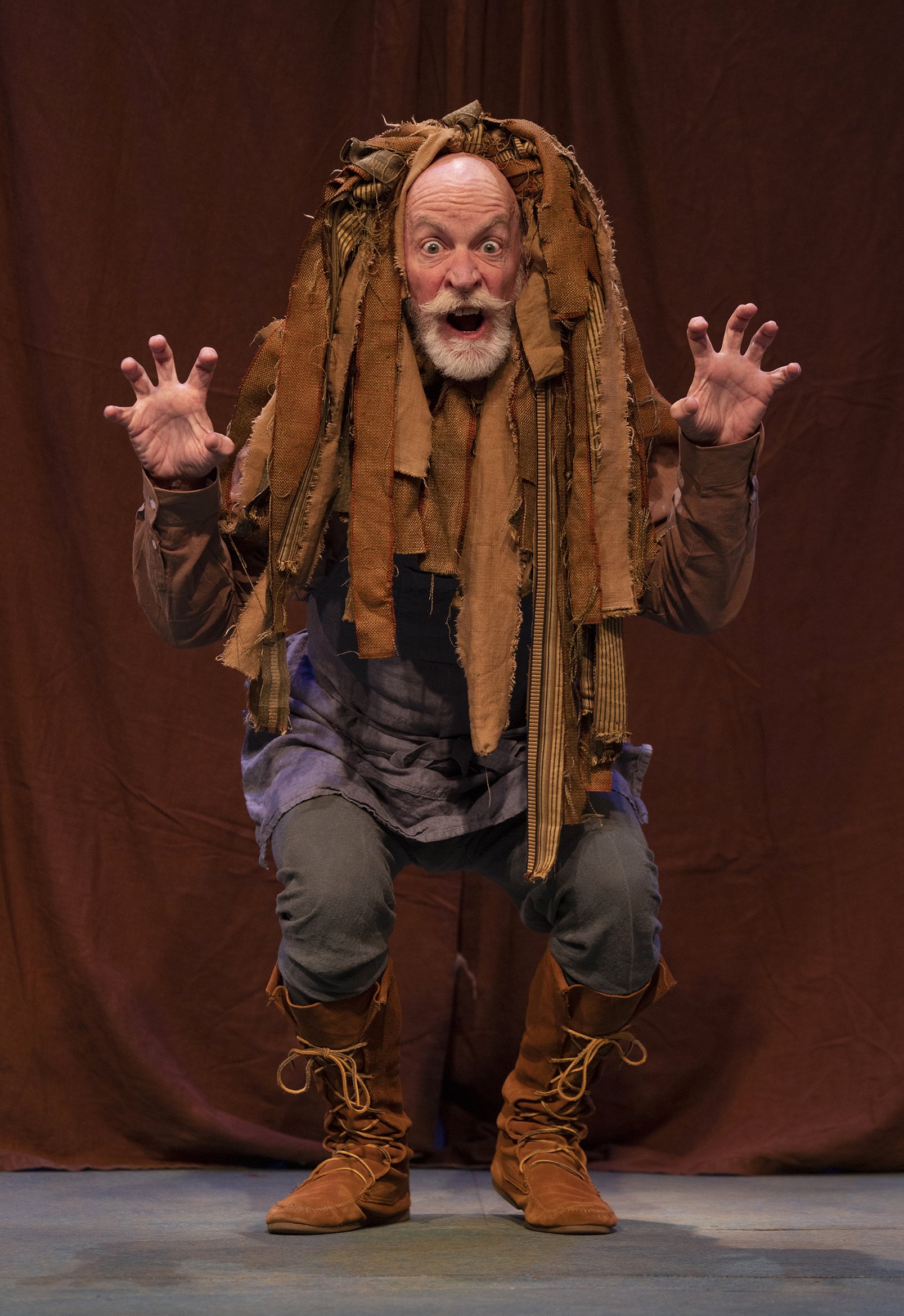 Jim Fye as Snug the Joiner, playing the Lion in "The Most Lamentable Comedy and Most Cruel Death of Pyramus and Thisbe." Photo by Tim Fuller.