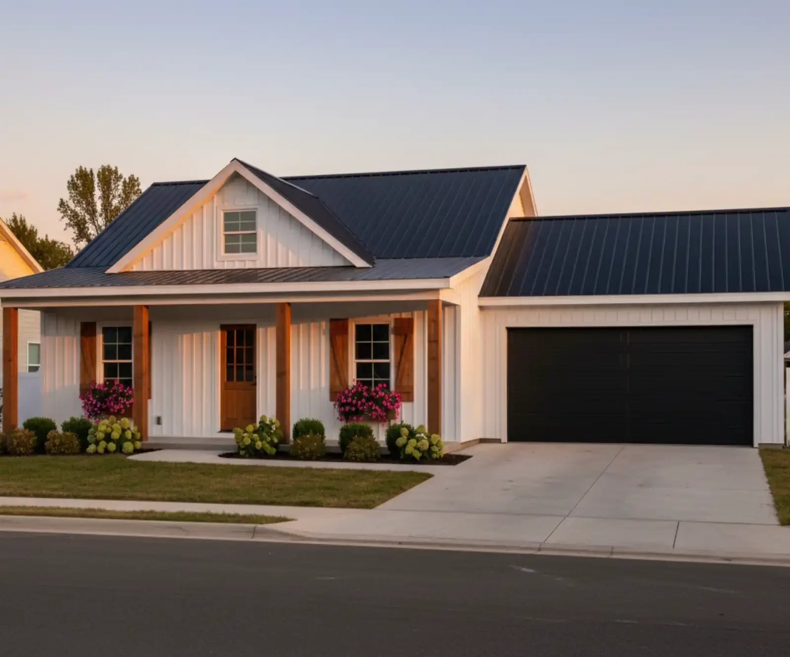 The Ironwood, a beautiful white metal and wood accent frame kit barndo home, 2 car garage, gabled roof, beautiful curb appeal by Homerun Building Supply, and up to 100% financing with BuildBuyRefi.com