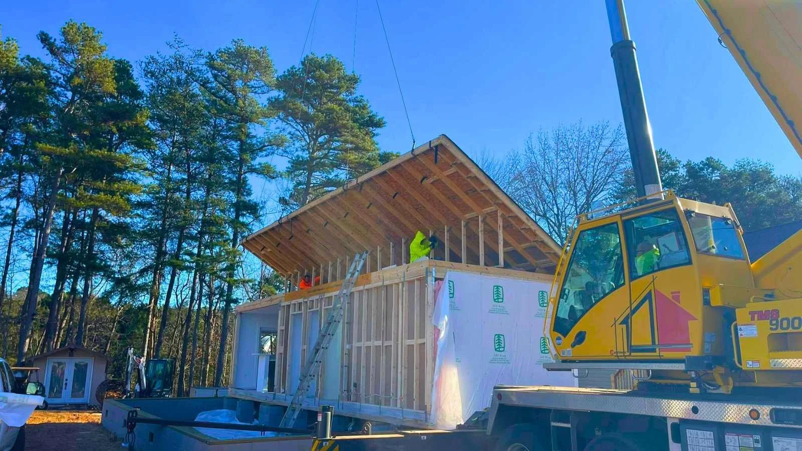 Beautiful ADU Modular Property being installed, perfect for guests, in-laws, and able to be matched to your current home, tucked neatly in your private backyard, offered by Streamline Modular Homes LLC of North Carolina