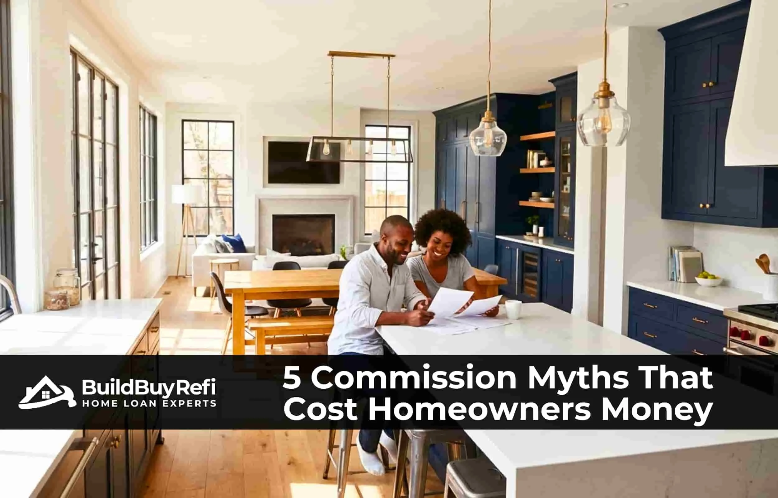 A couple sitting at their beautiful marble kitchen island, navy counters, and wood flooring reviewing the myths about real estate fees costing homeowners money, and commissions saved by working with BuildBuyRefi.com