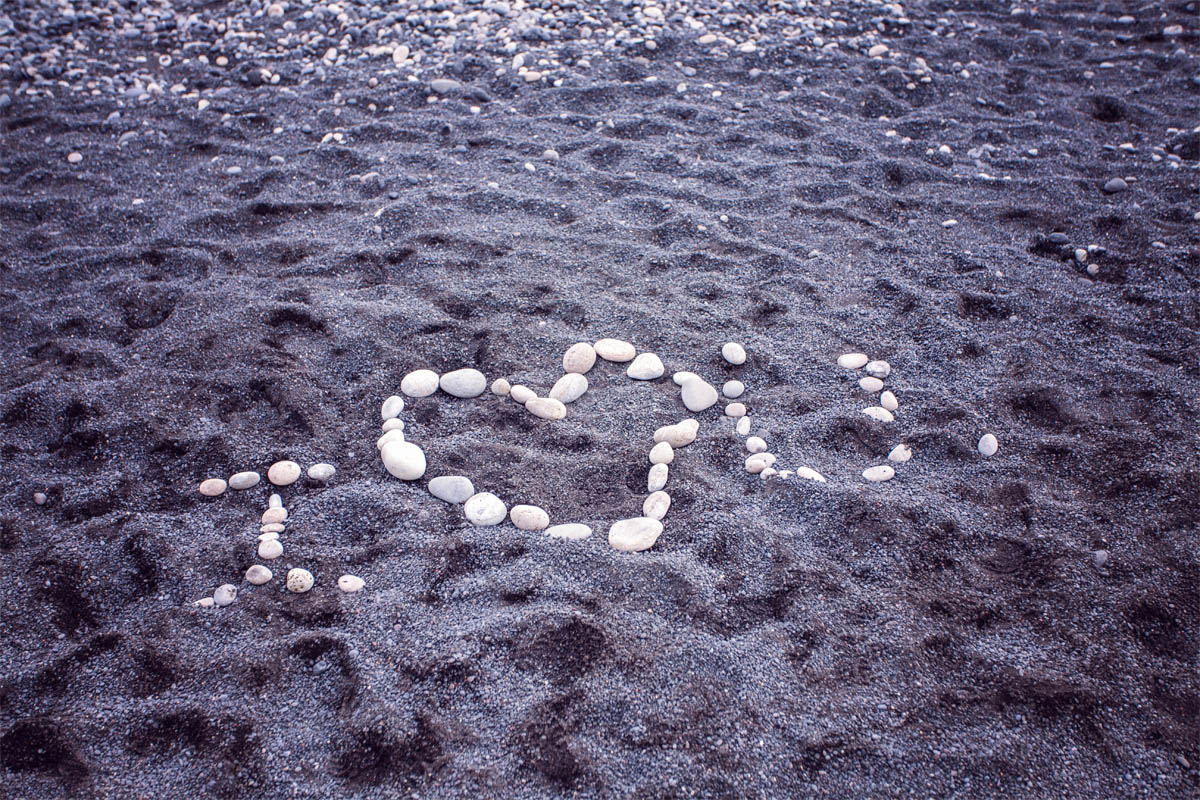 White stones, black sand. A message made for someone else, but surely, I felt, left for me.