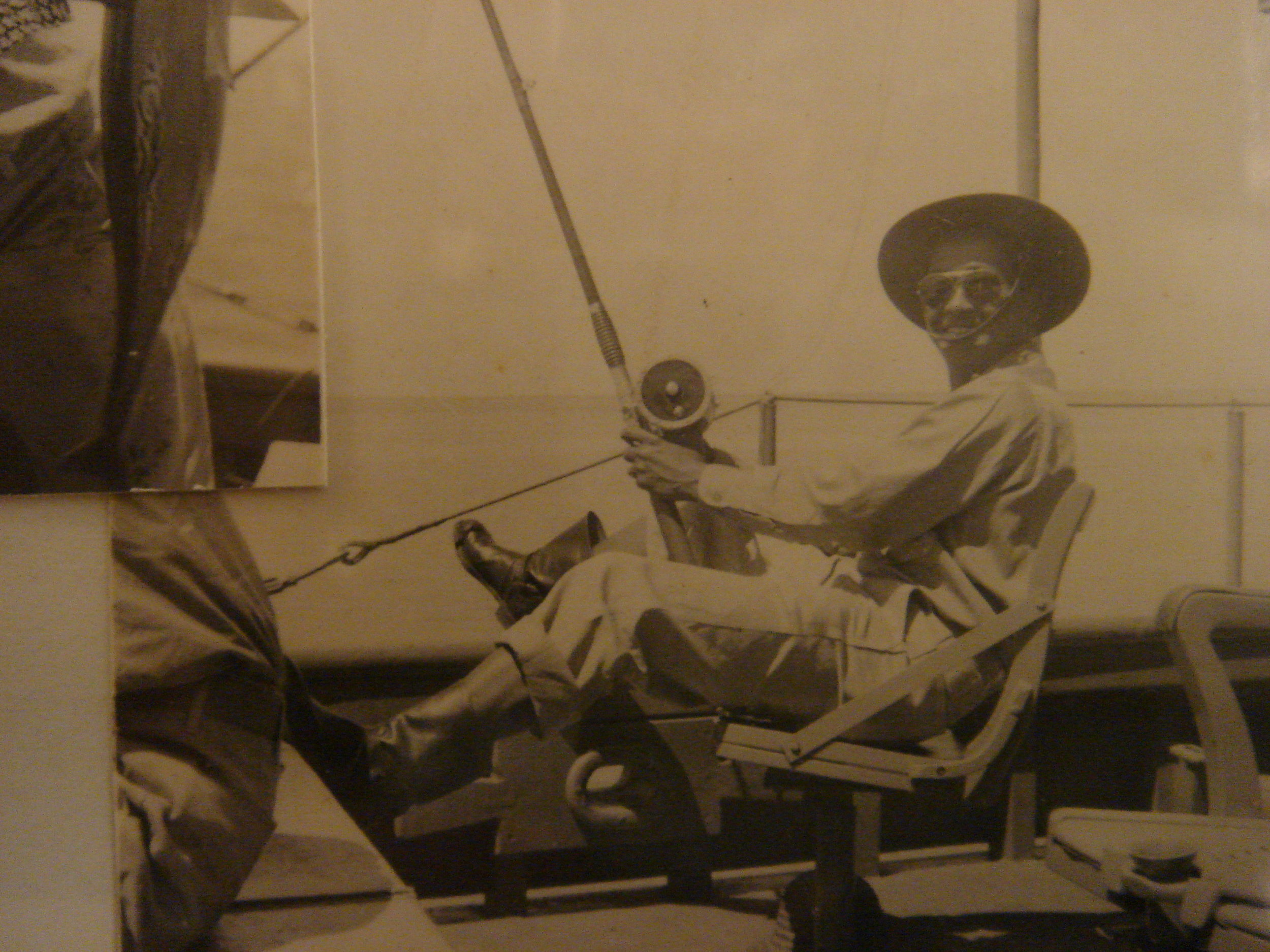 Dad deep sea fishing in Major's Uniform, ca. 1944-1945