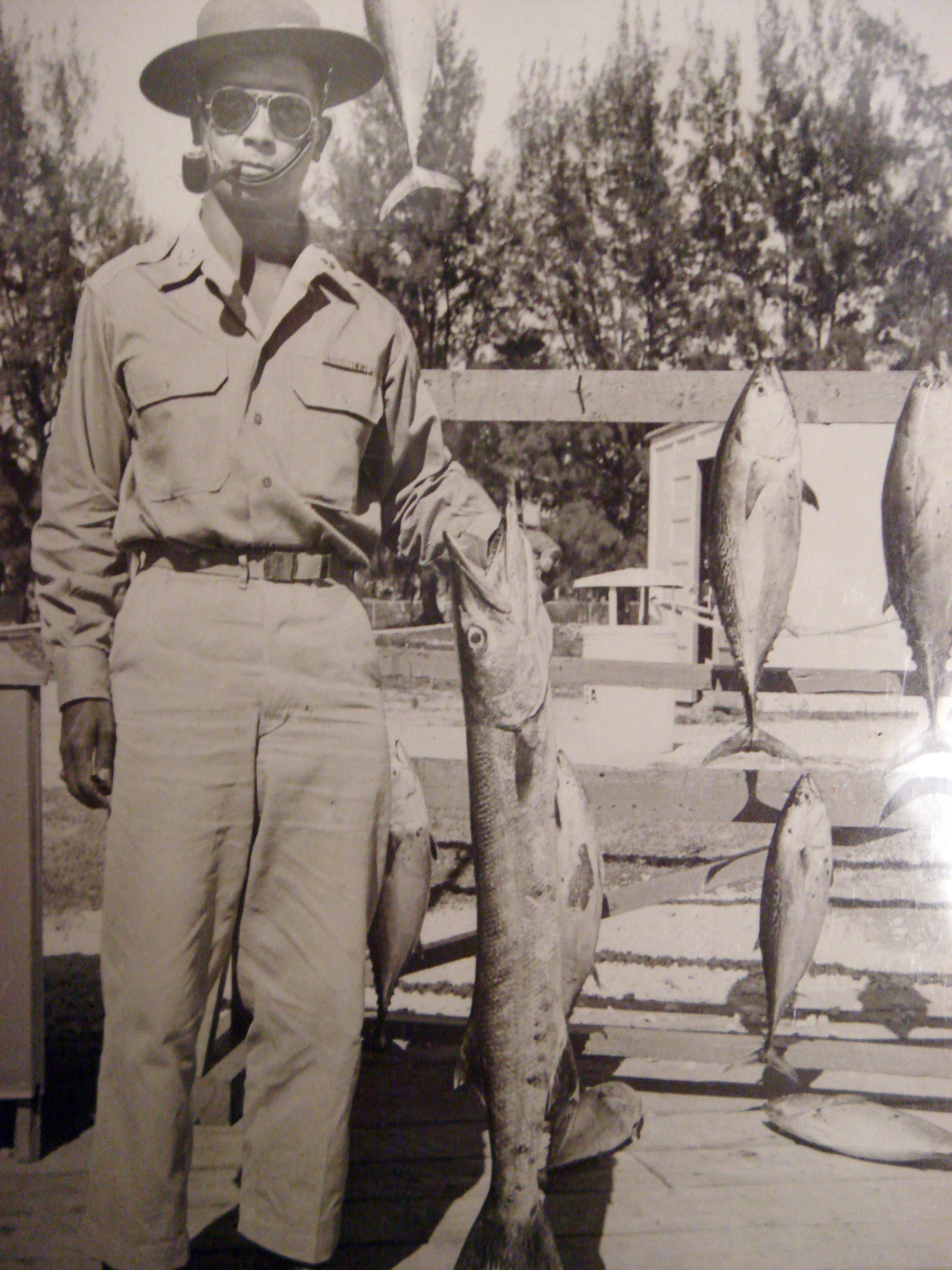 Major Chan, still gaunt from the jungle, with a Barracuda and Tuna, 1944-1945