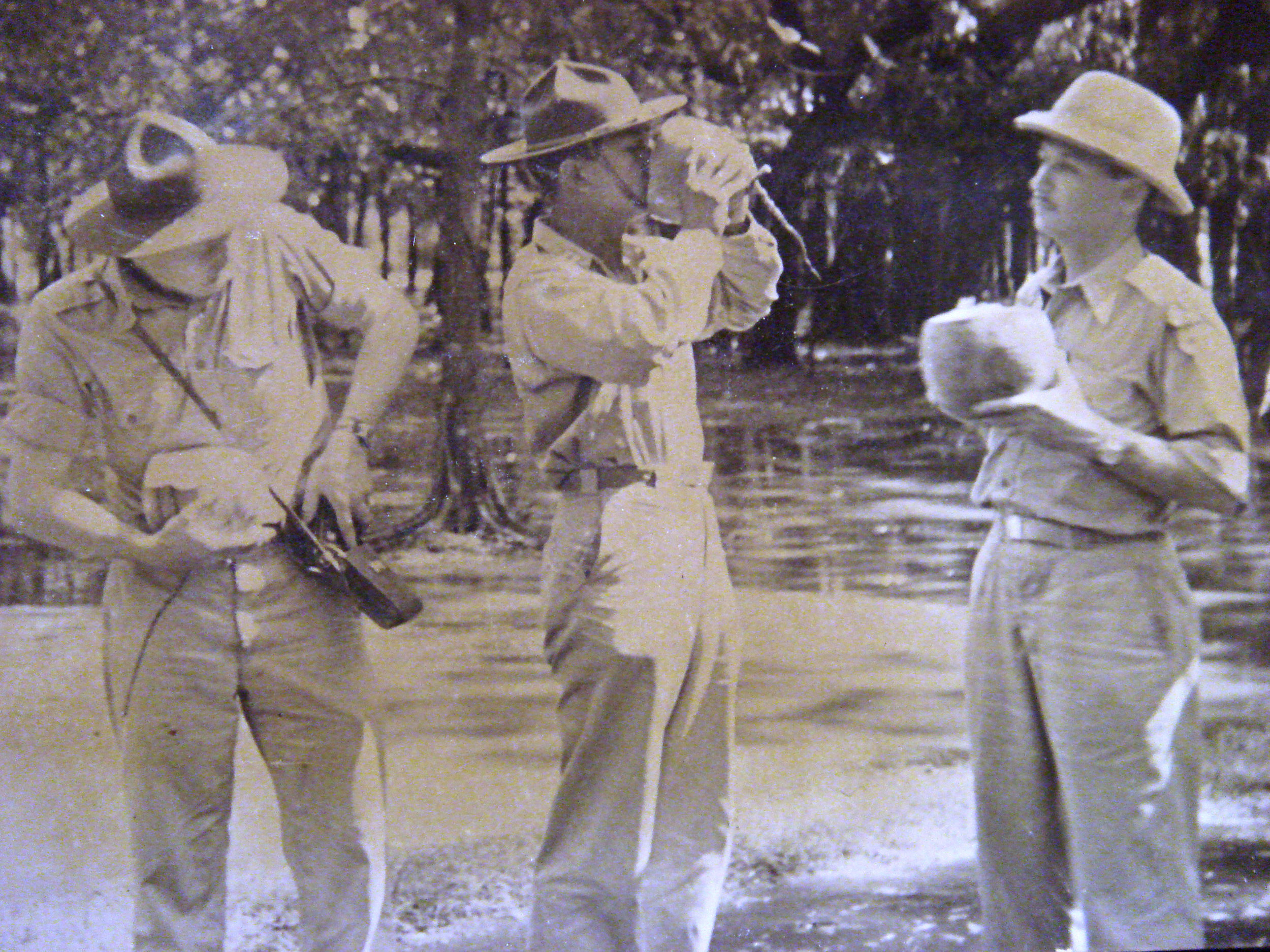 Drinking coconut water in the Burmese jungle ca. 1944