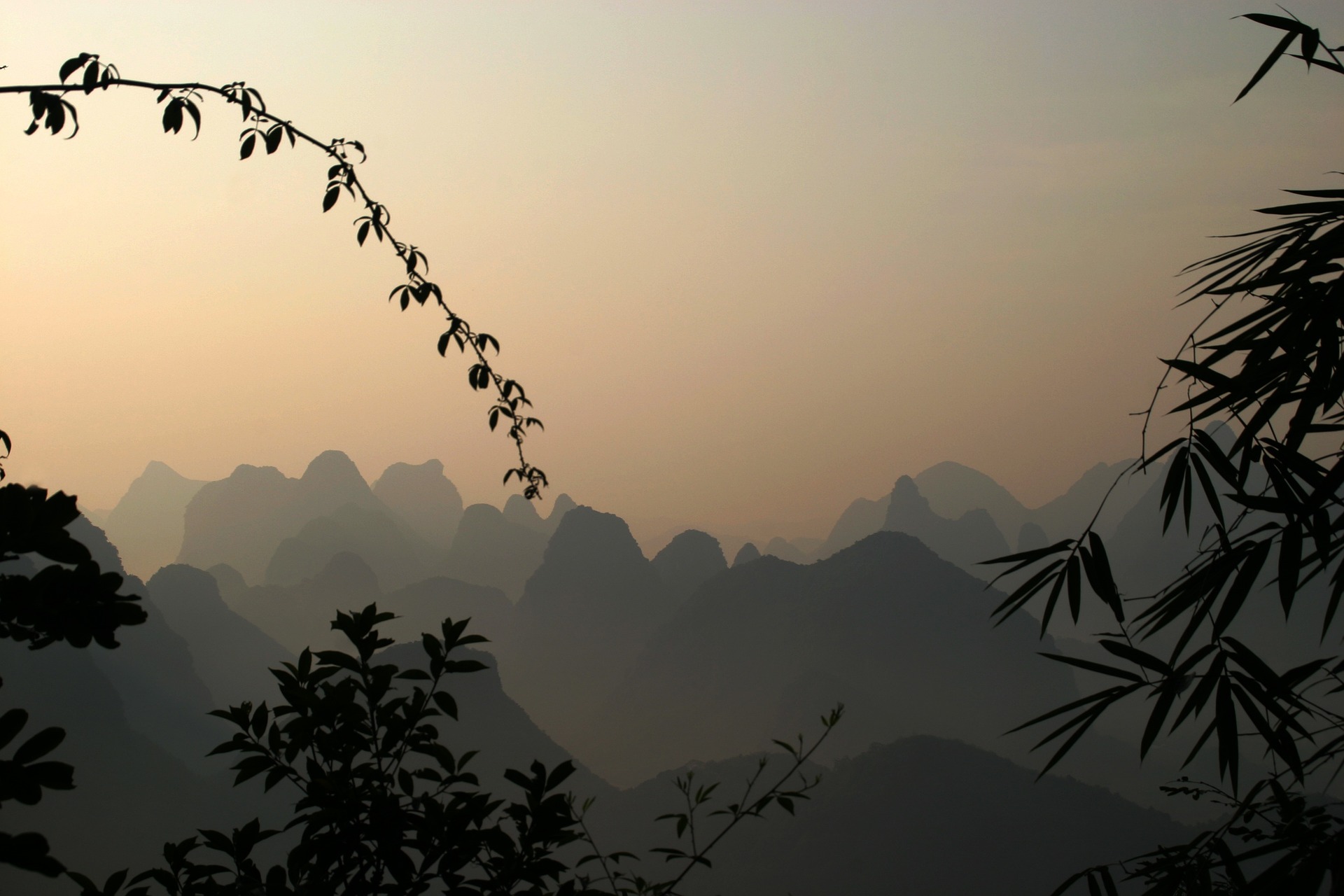 The Guilin Mountains showing the shades of blue you can expect from a Chinese mountain landscape at dusk.