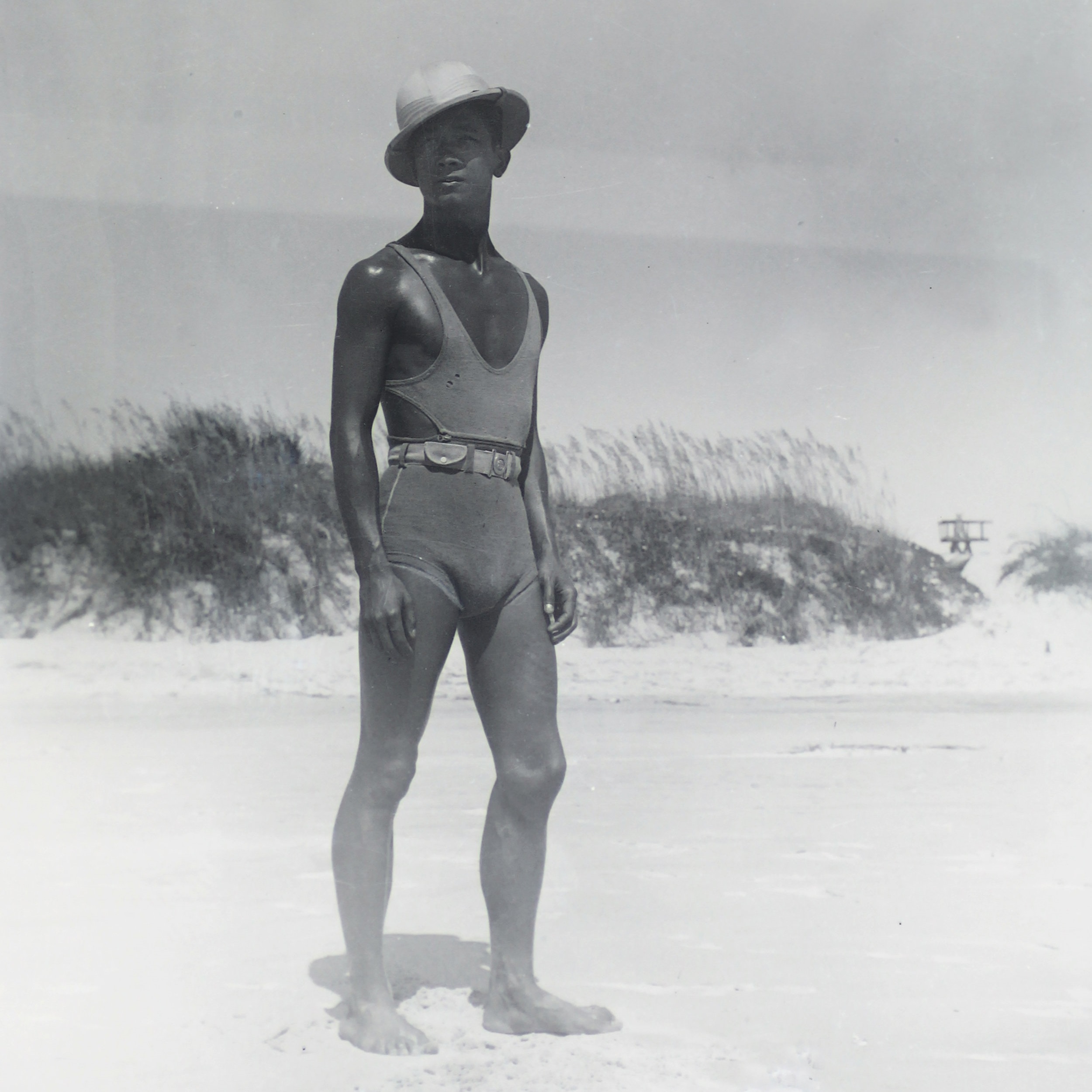 Earl Chan, life guard, and the Adonis of Savannah Beach.