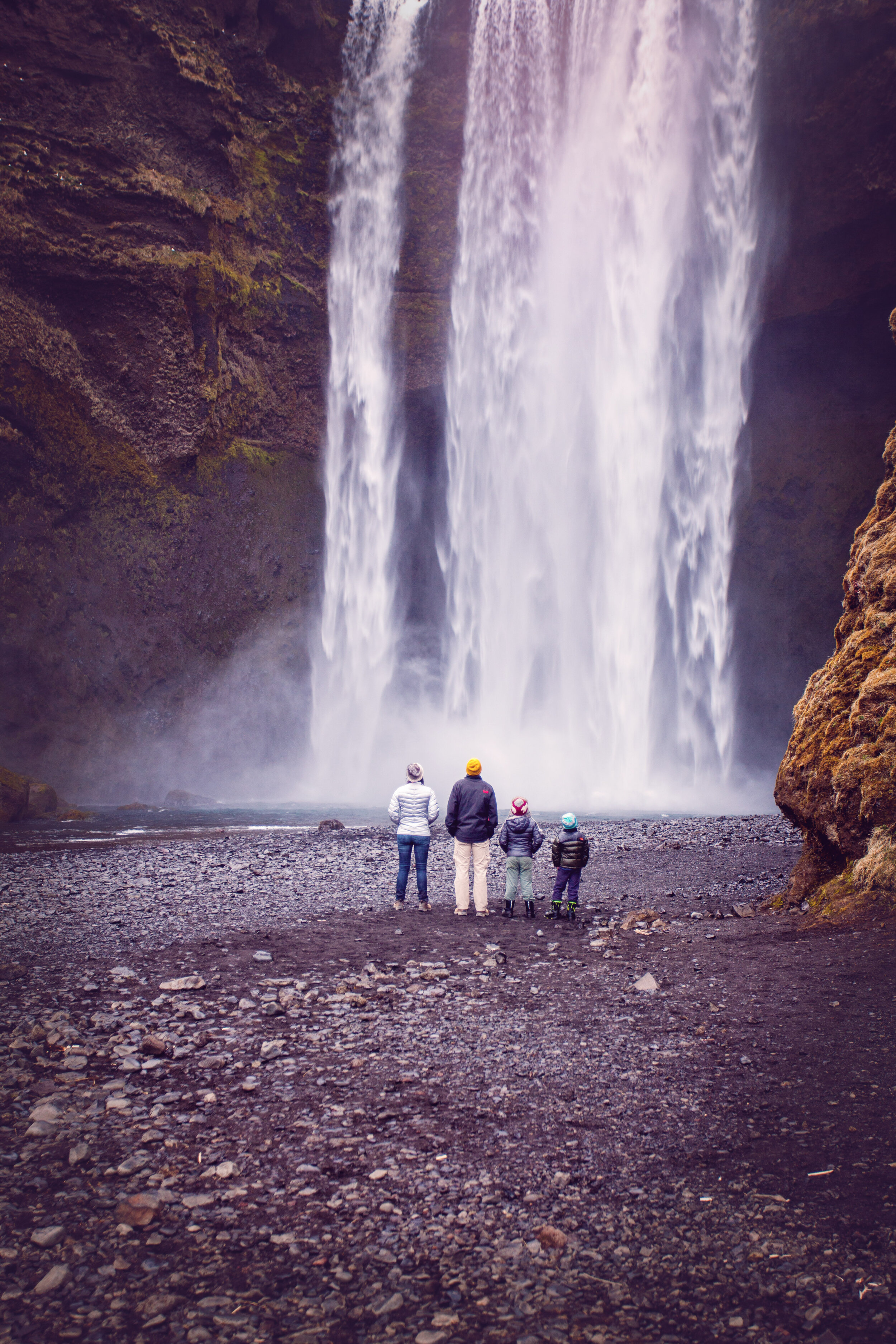 Brent, the kids and I at the base of the mighty Skogafoss in Iceland.