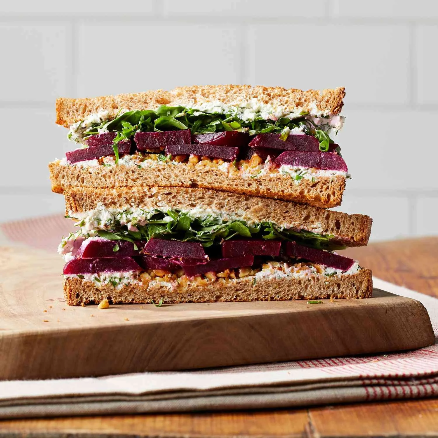 7994089-pickled-beet-arugula-and-herbed-goat-cheese-sandwich-beauty-176f872949b34b48b6c41ac3fd1cae7c.jpg